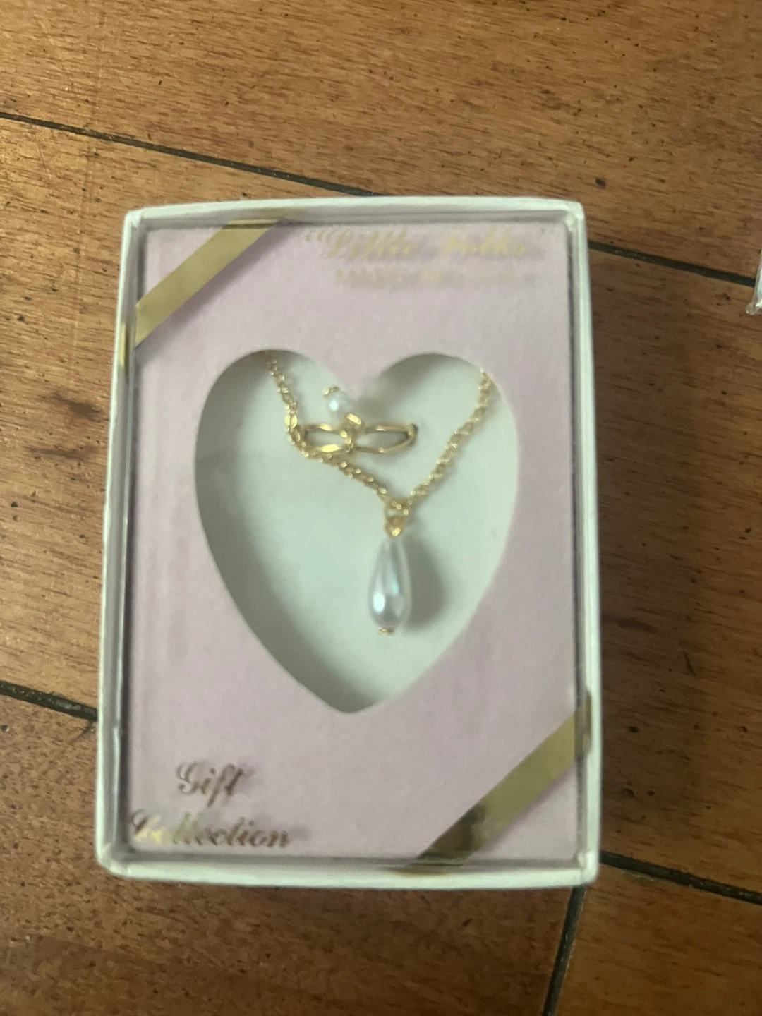 Gold-tone necklace with pearl pendant - photo 2