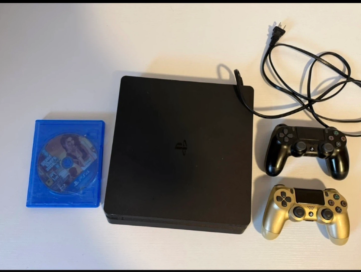 PlayStation 4 Slim with 2 Controllers and Game