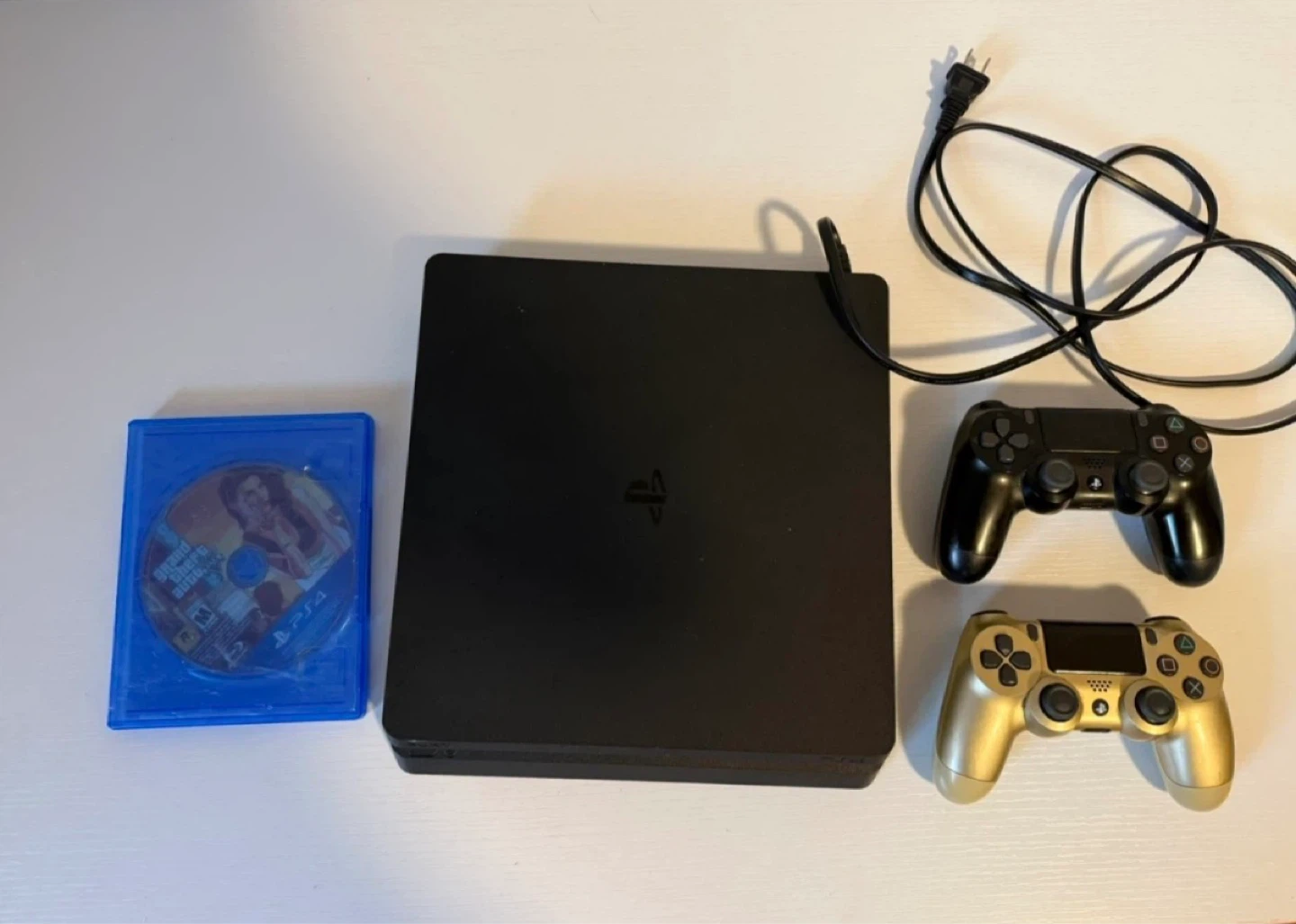 PlayStation 4 Slim with 2 Controllers and Game - photo 2