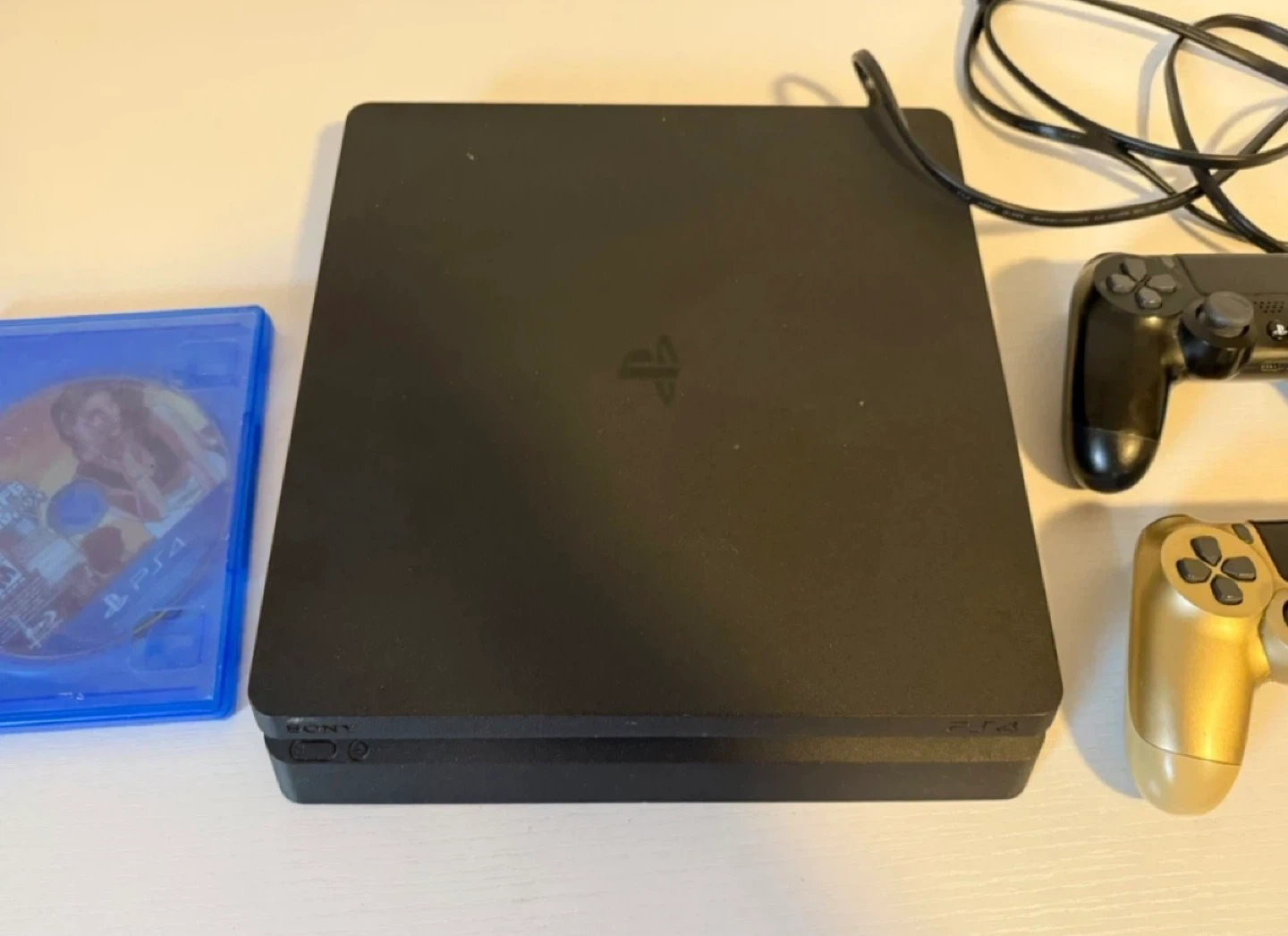 PlayStation 4 Slim with 2 Controllers and Game - photo 3