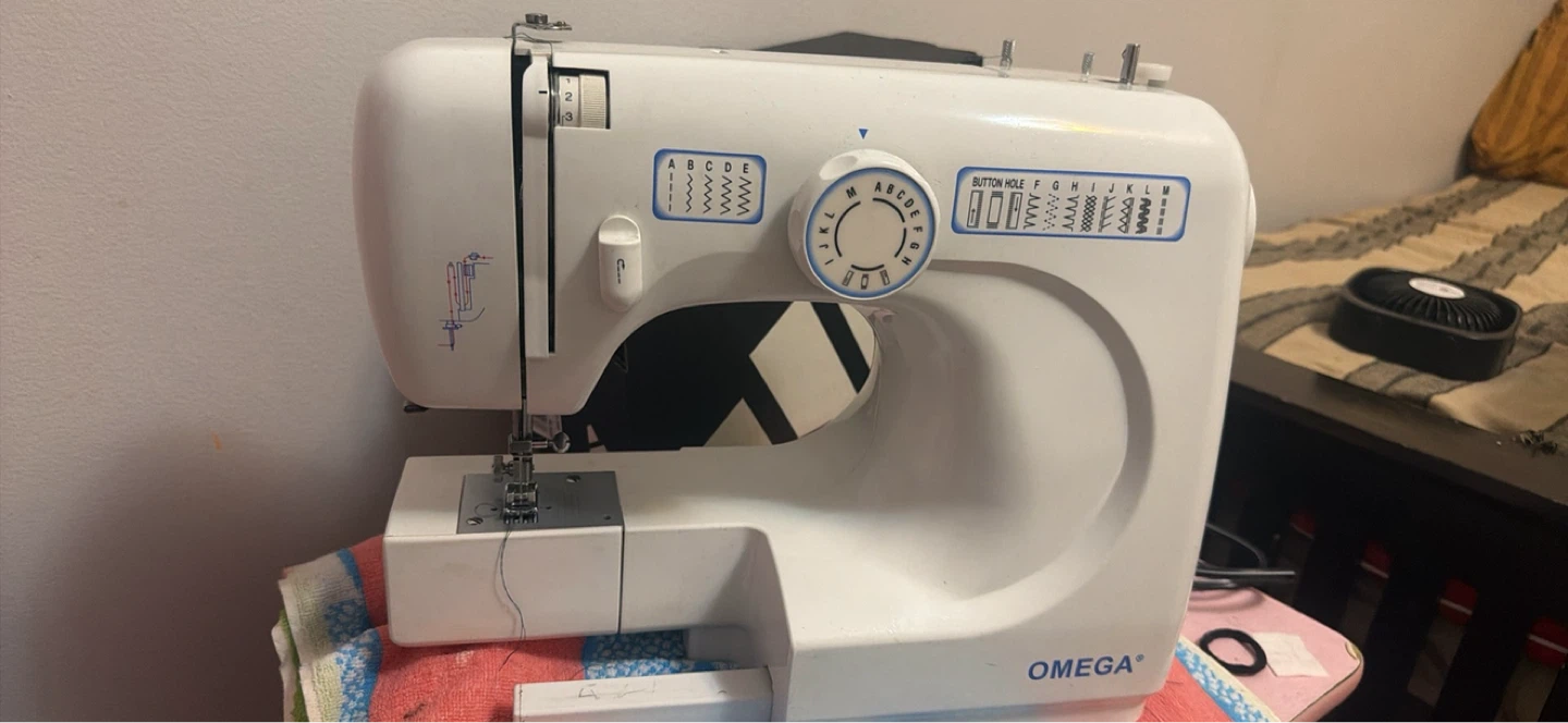 Omega Sewing Machine