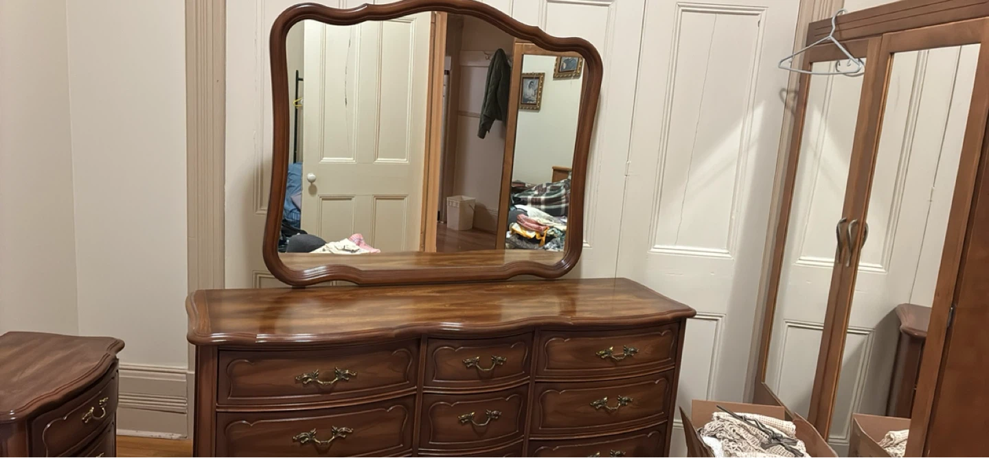 Antique dresser with mirror.