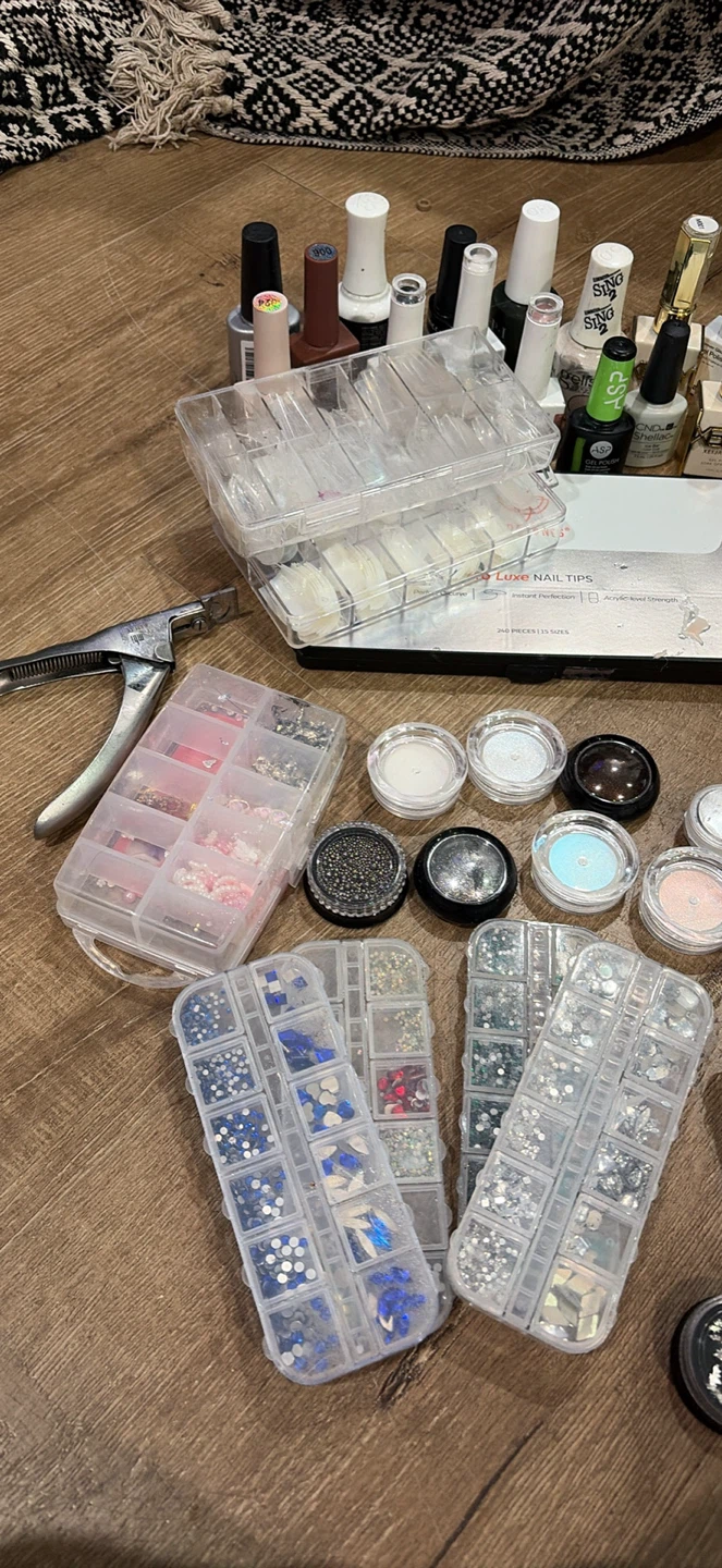 Assorted Nail Art Supplies and Polishes
