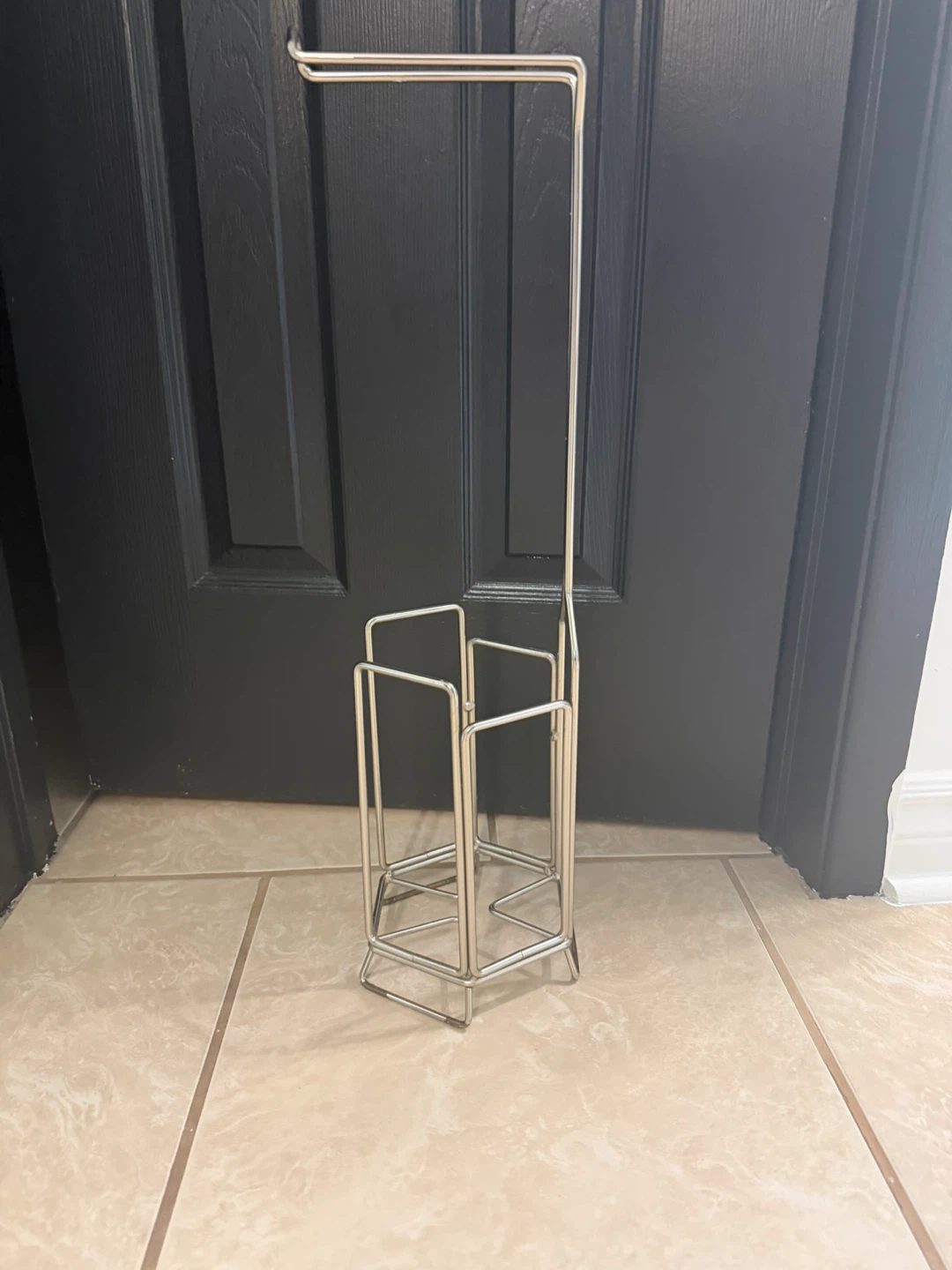 Silver toilet paper holder stand