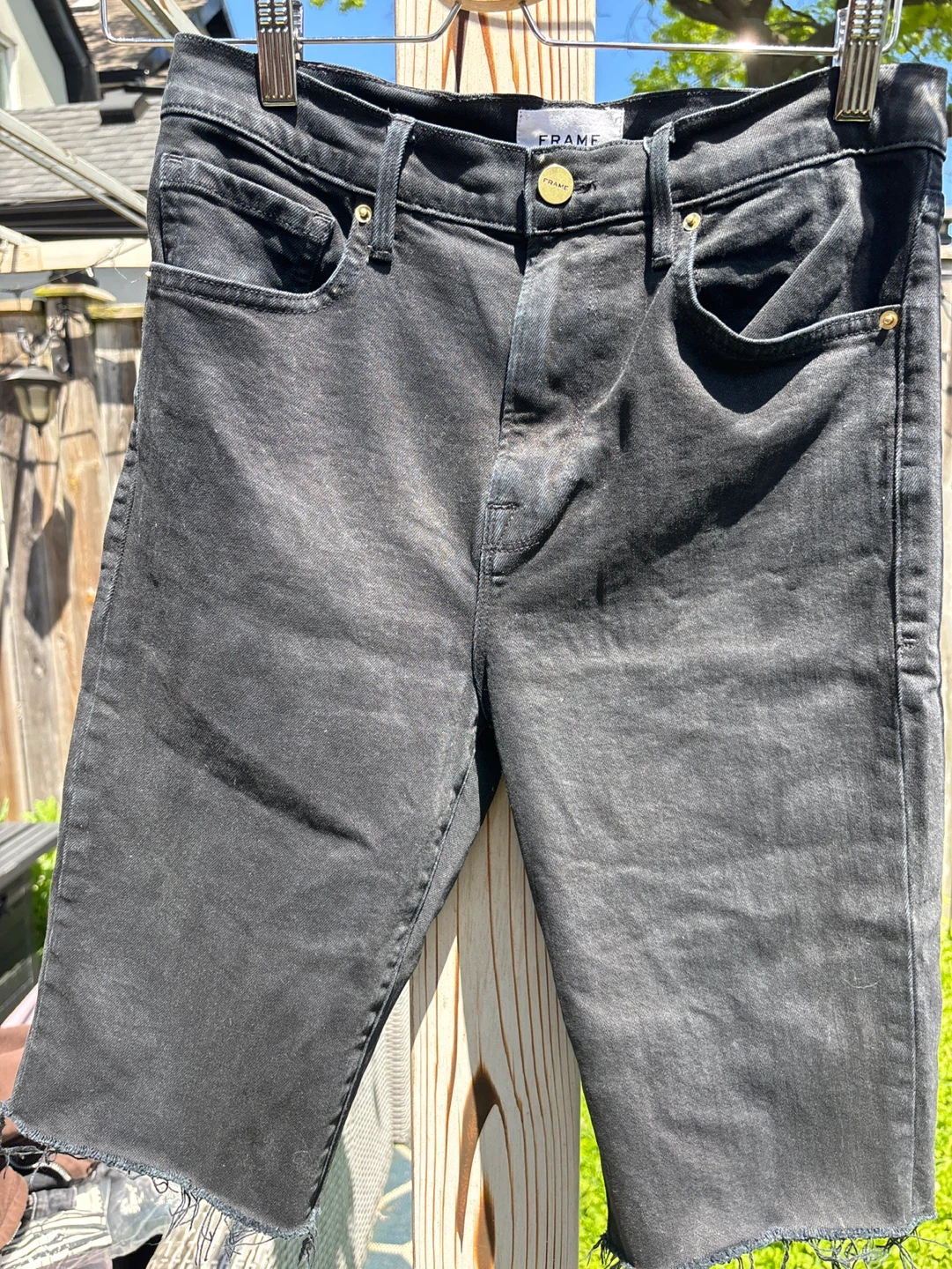 FRAME Black Denim Cutoff Shorts - photo 2