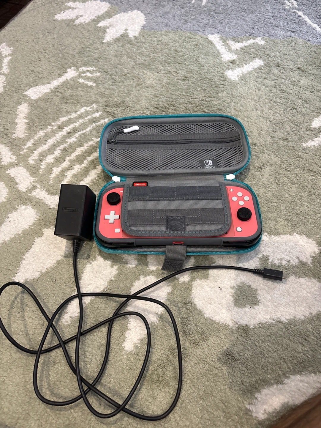 Nintendo Switch Lite Coral with Mario Kart 8 Deluxe