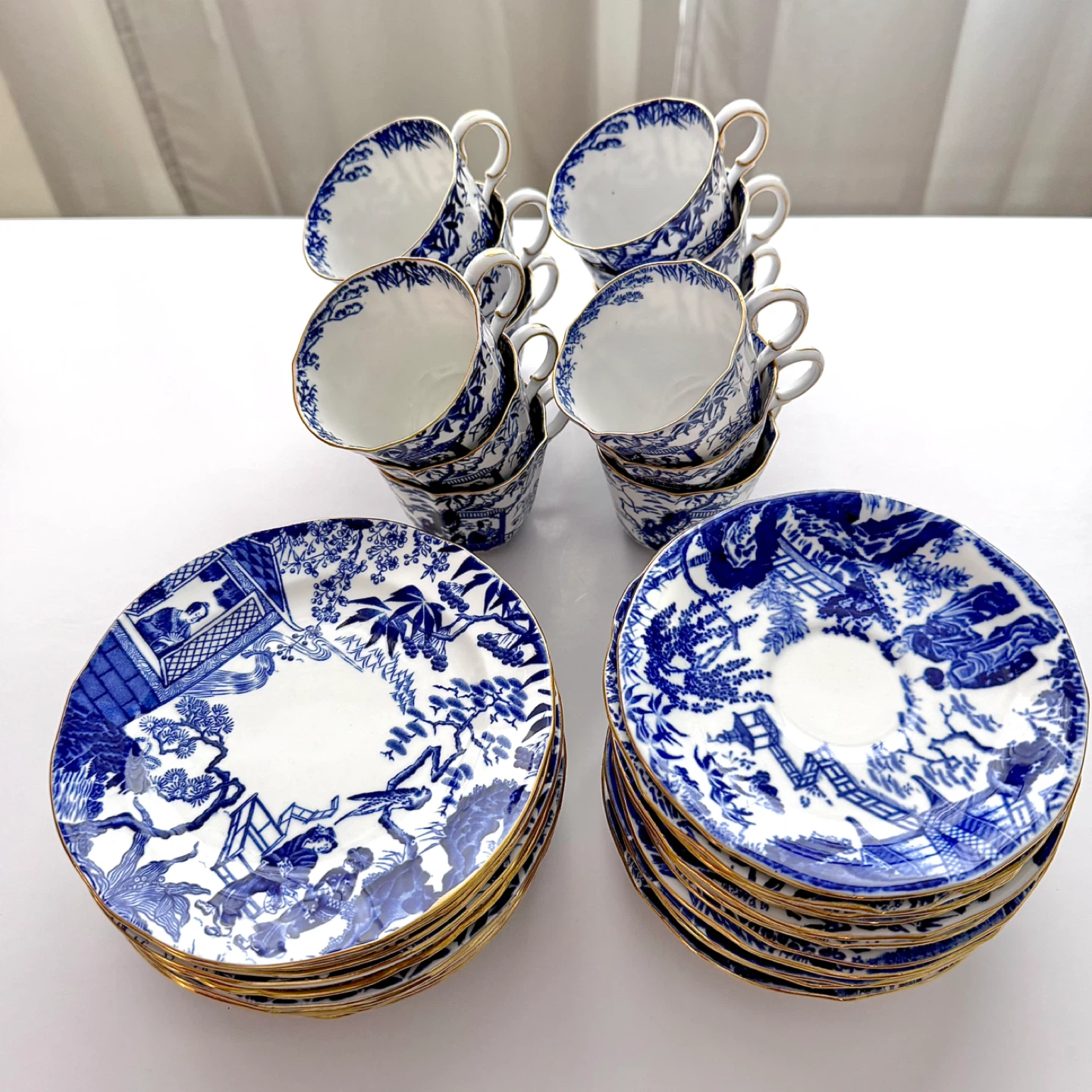 Set for 12 Royal Crown Derby Mikado teacup trios