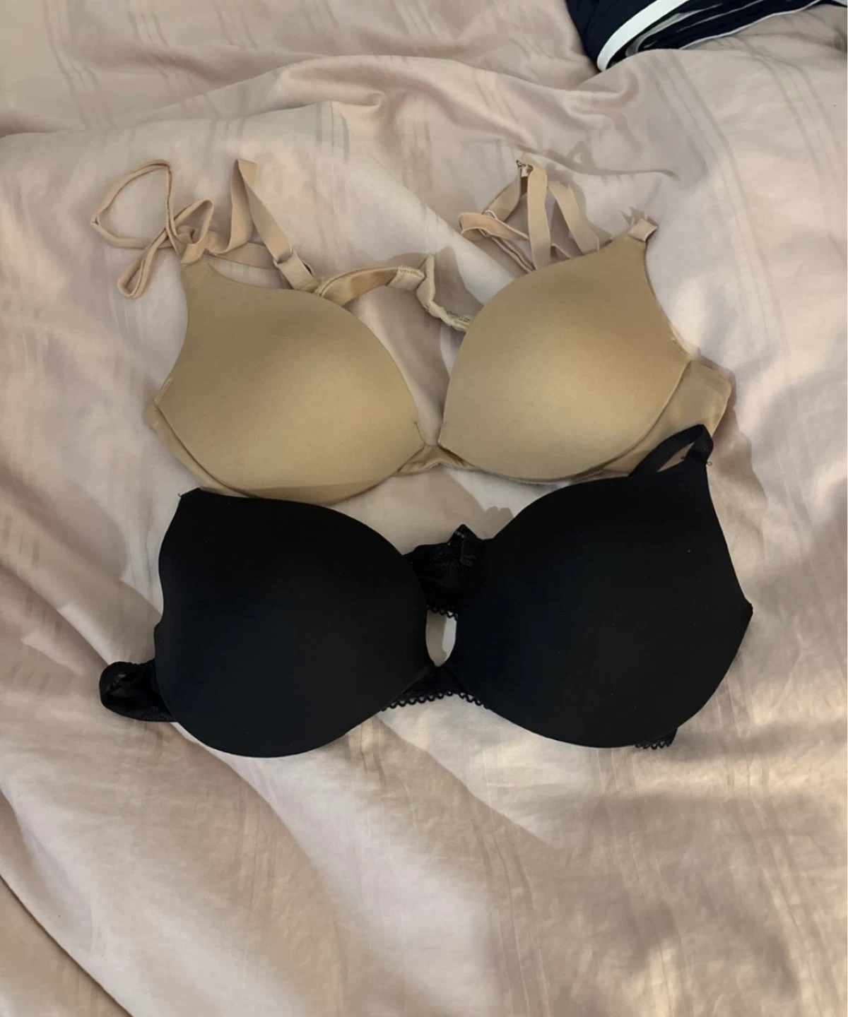 Two 32B / 34B push up bras (beige and black)