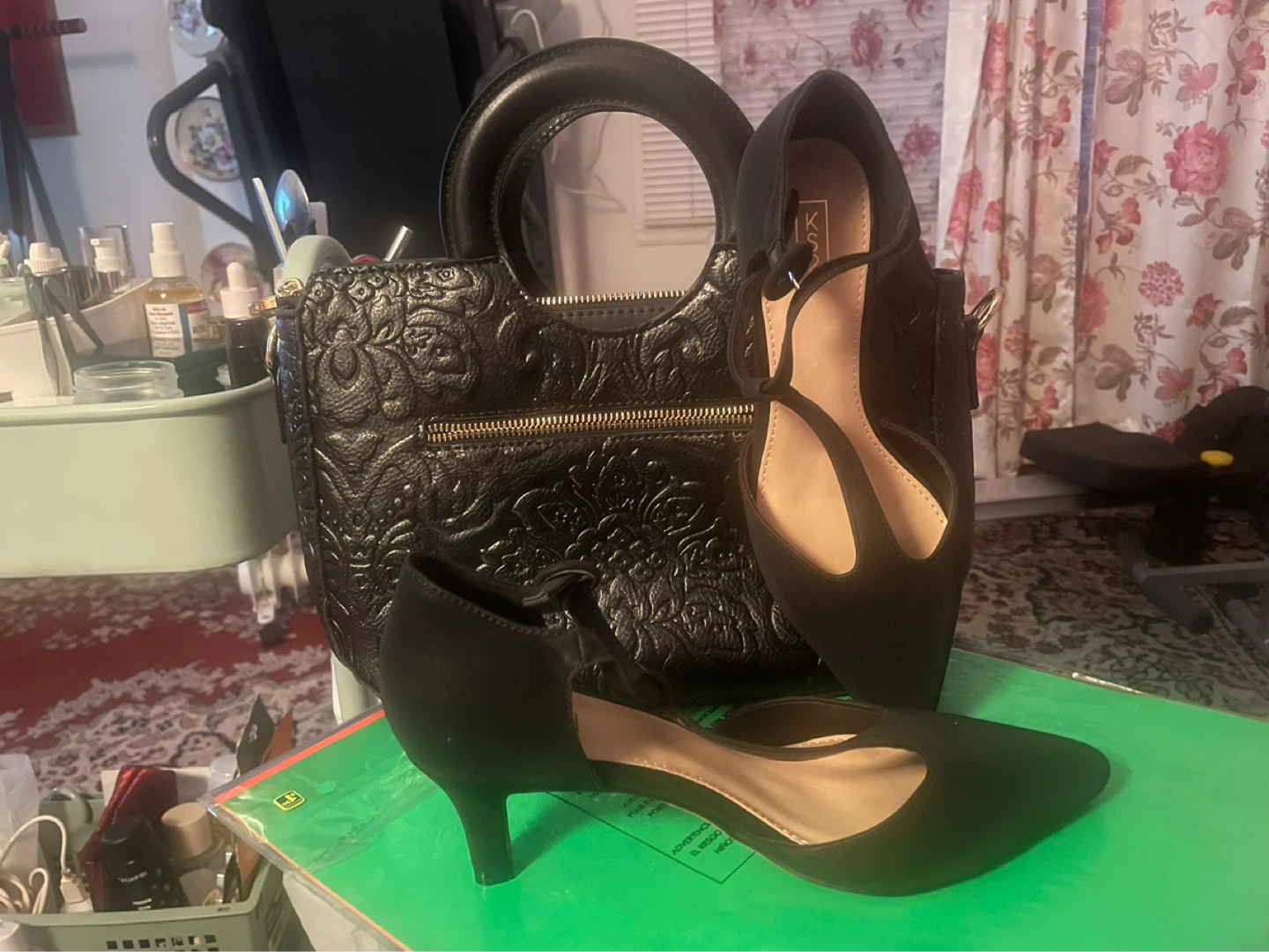 Black purse and heels