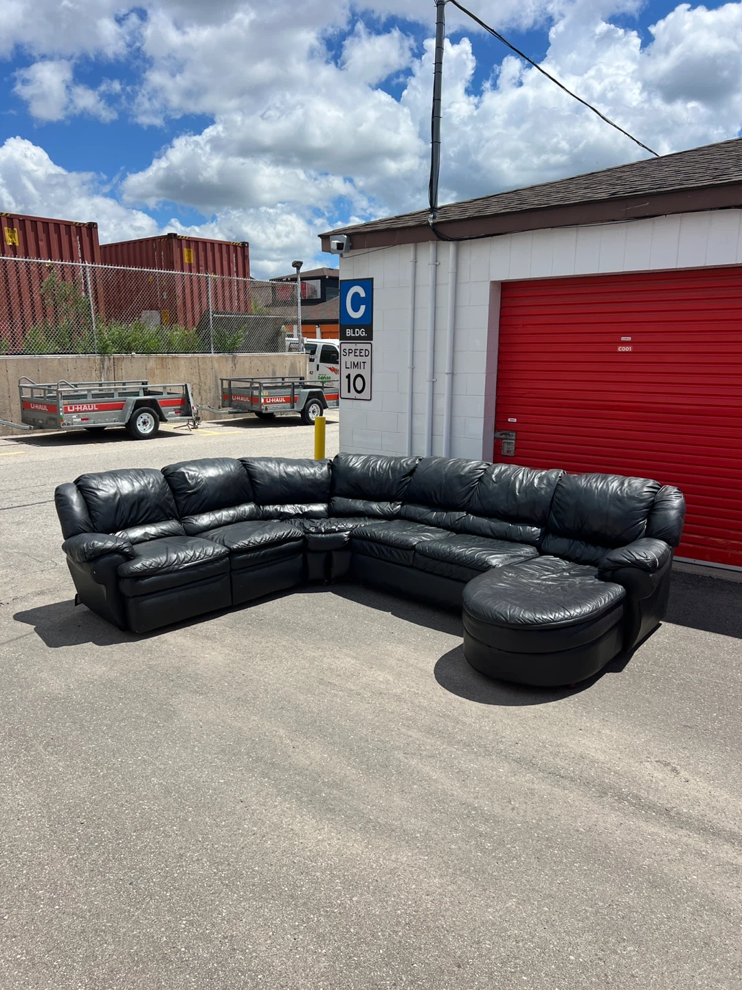 Black Leather L Sectional willing to deliver for free aswell