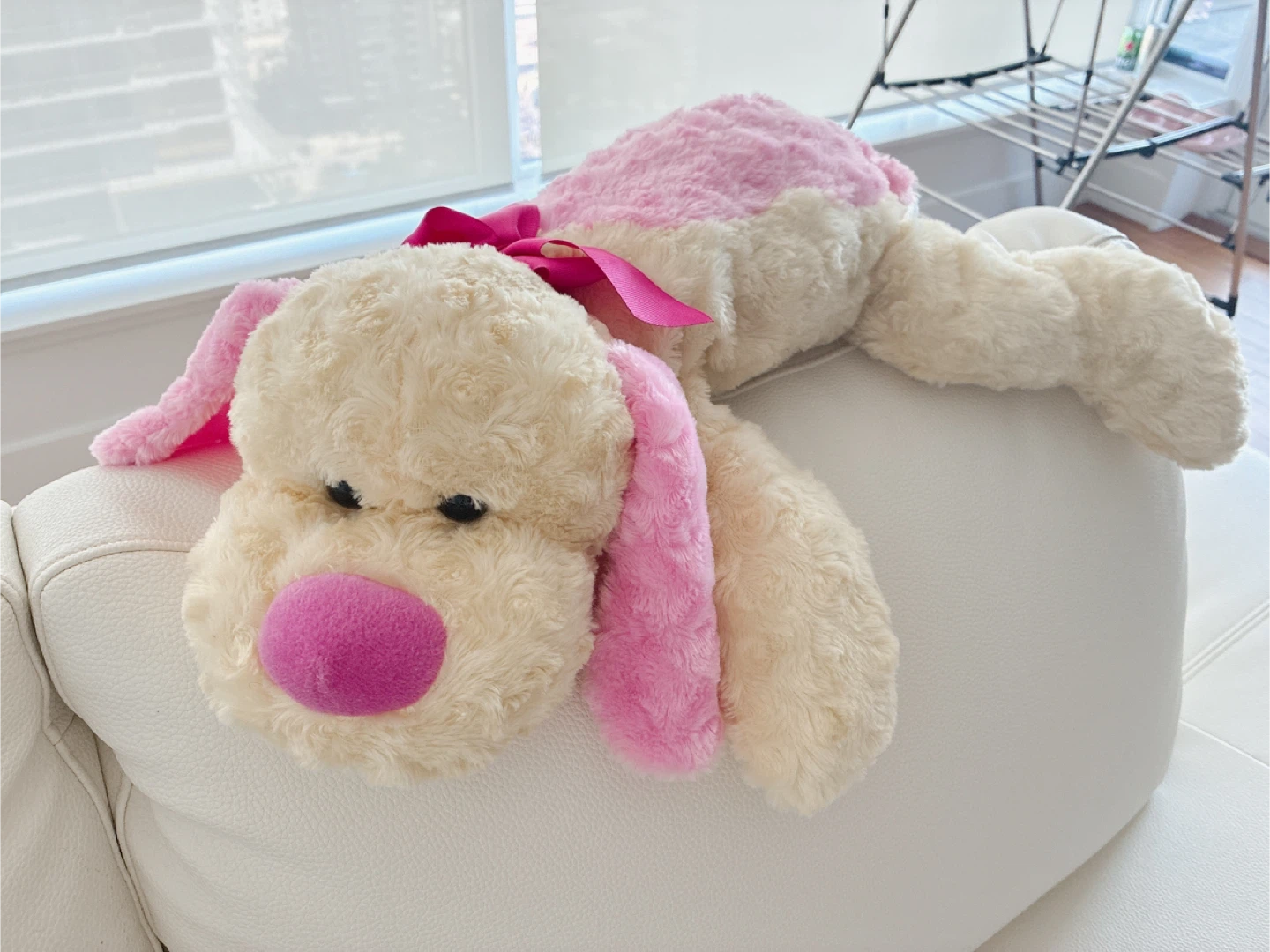 Large Plush Dog Toy with Pink Accents
