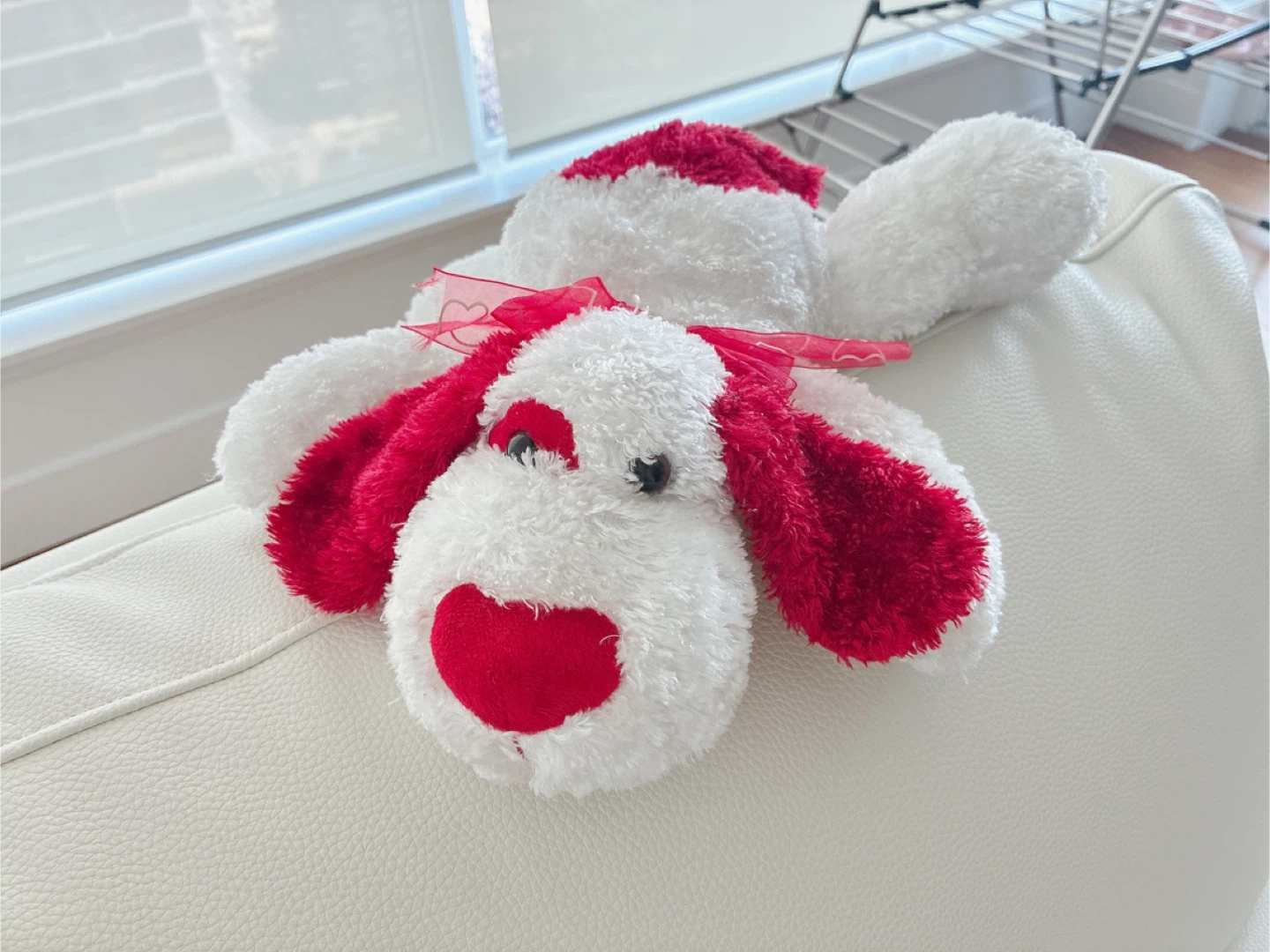 White and Red Stuffed Dog Toy with Ribbon