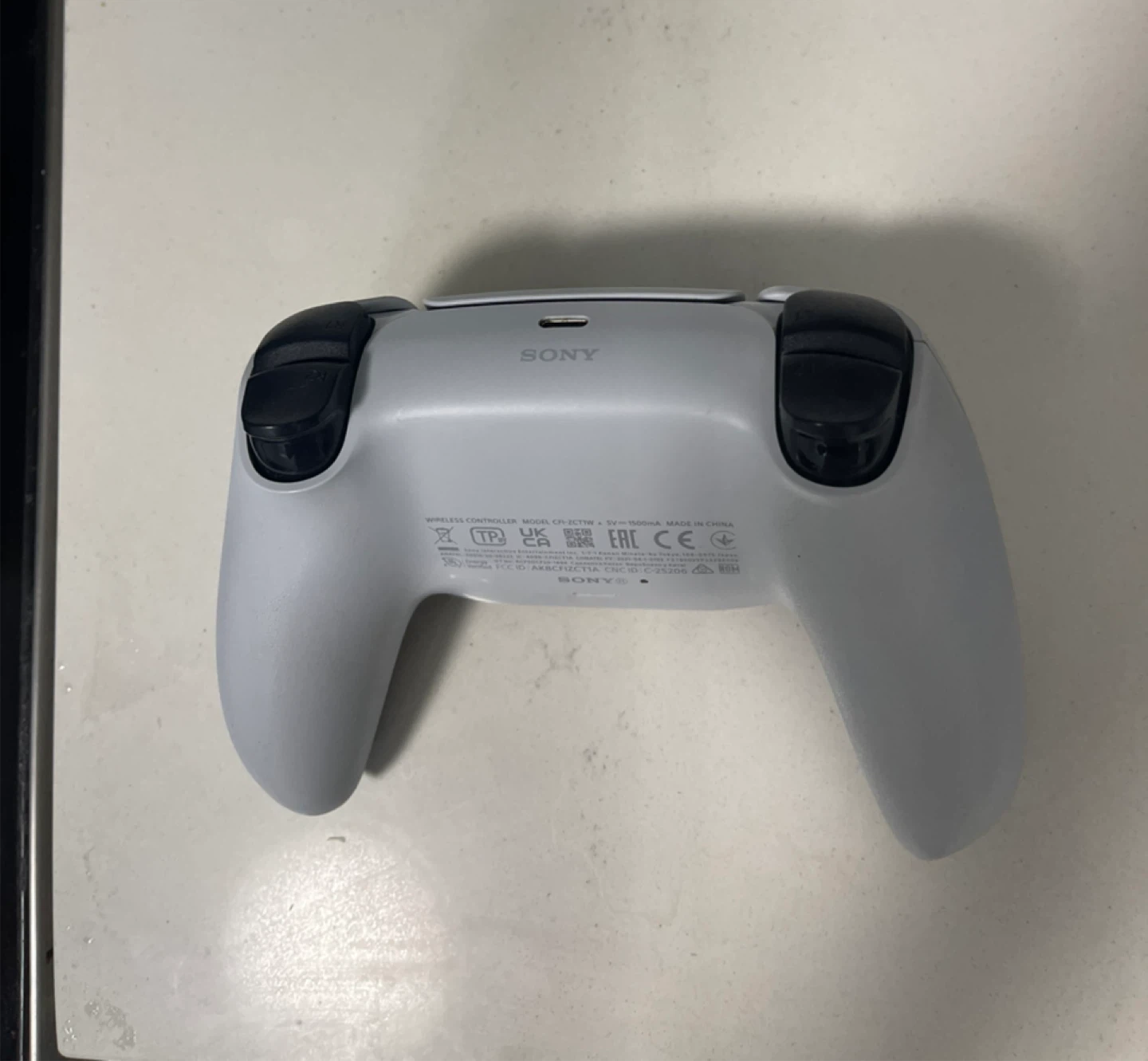 PS5 DualSense Wireless Controller - photo 2