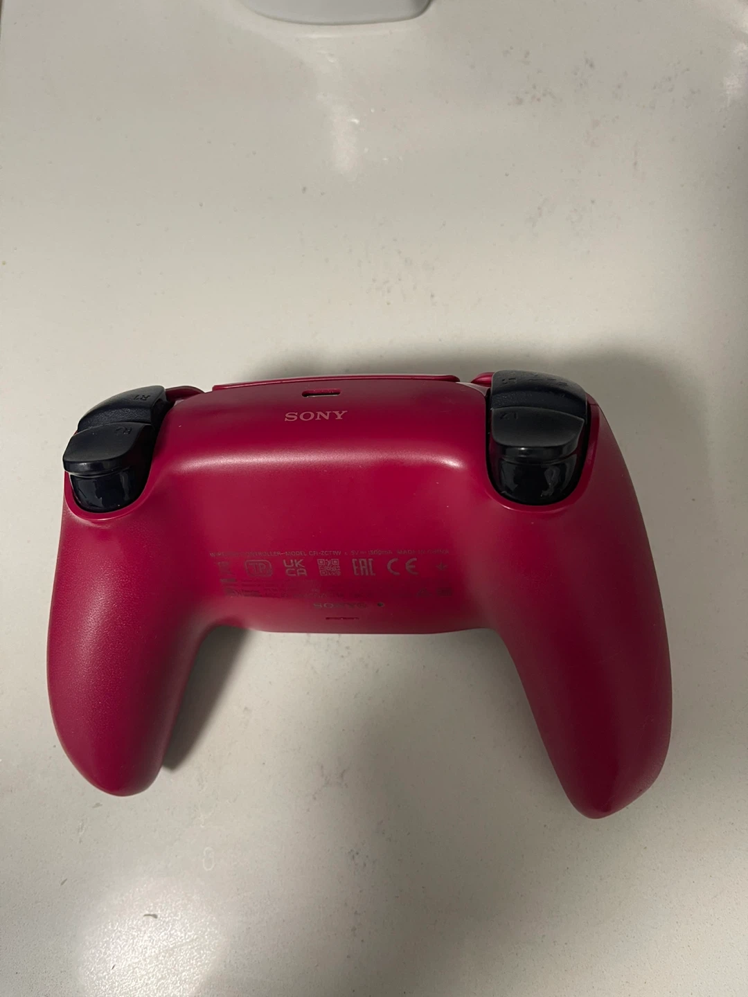 PS5 DualSense Wireless Controller - Cosmic Red - photo 2