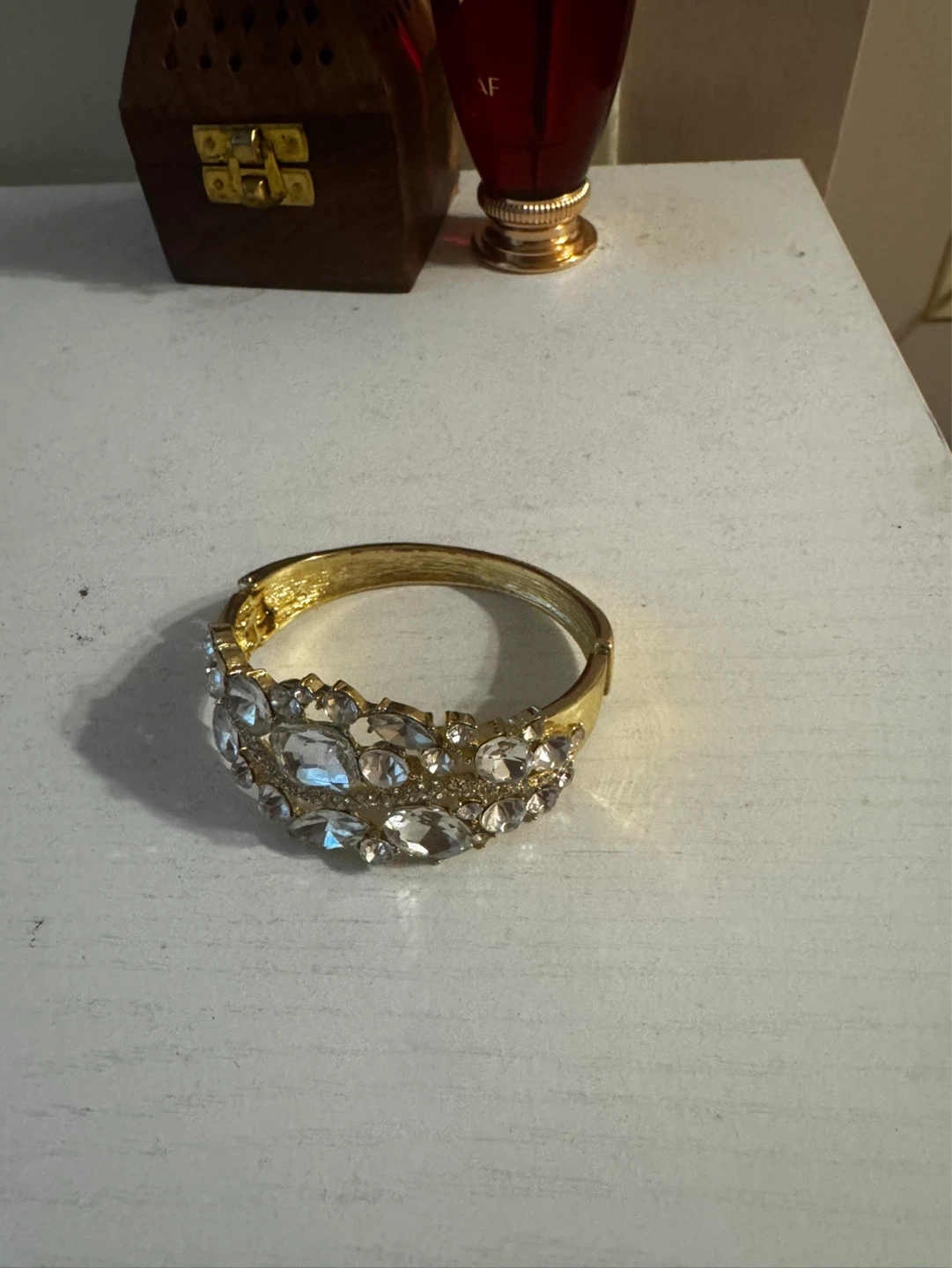 Gold-tone cuff bracelet with clear stones