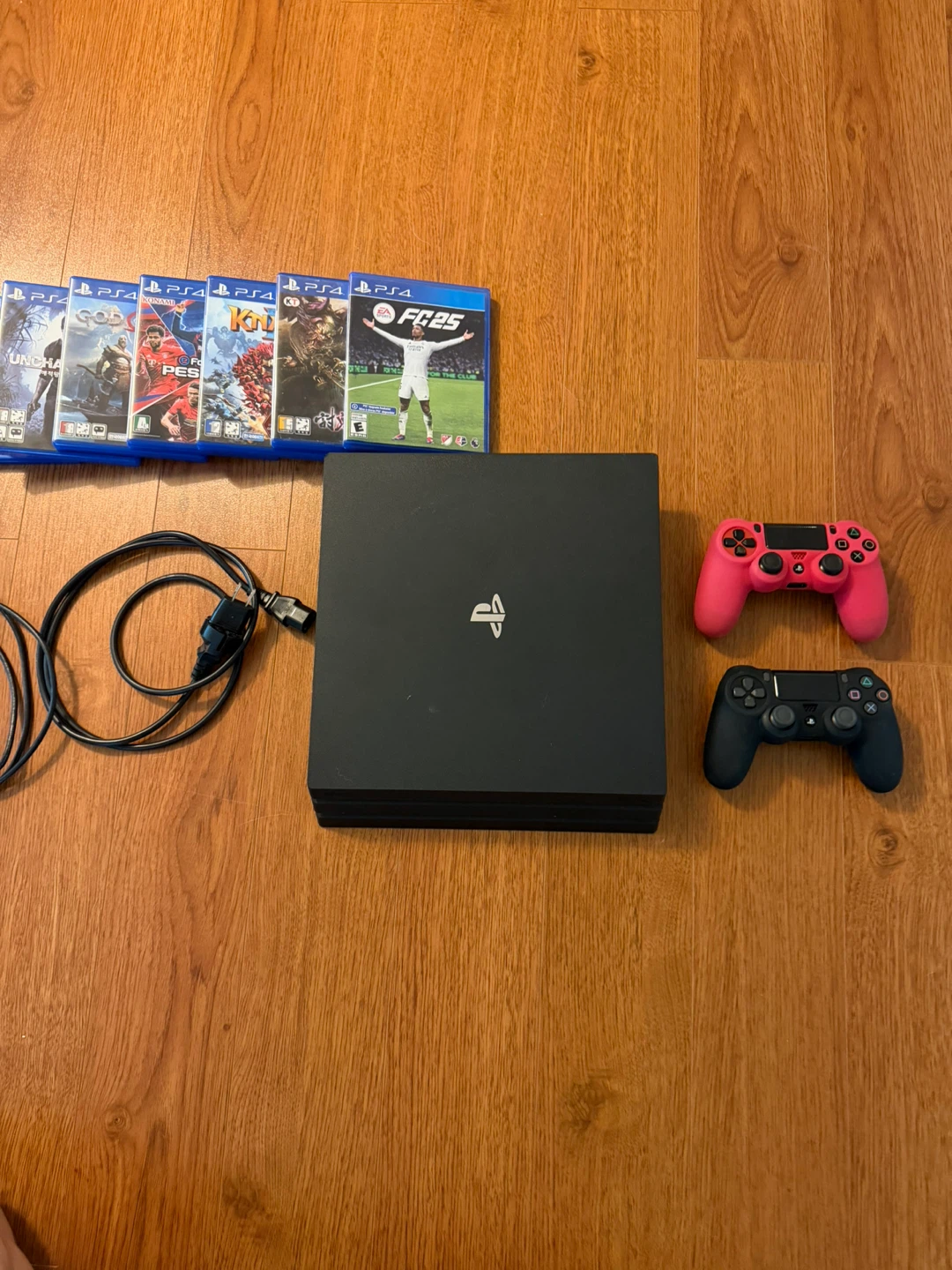 PlayStation 4 Pro Console with 6 Games and Controllers