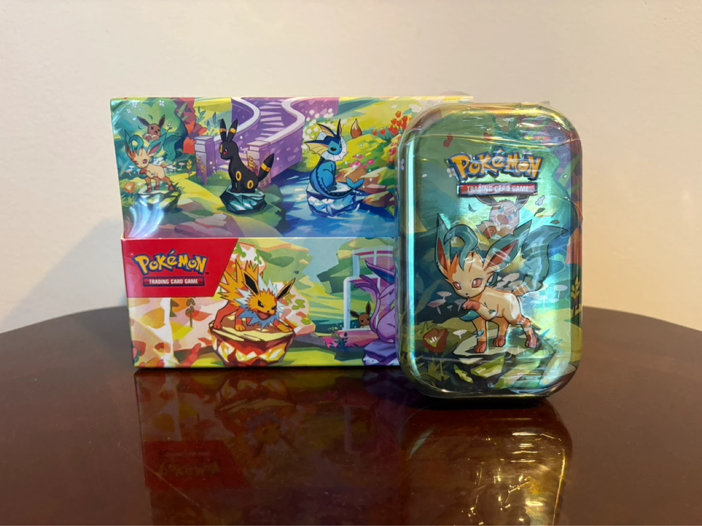 Prismatic Evolution Display Box + 1 tin