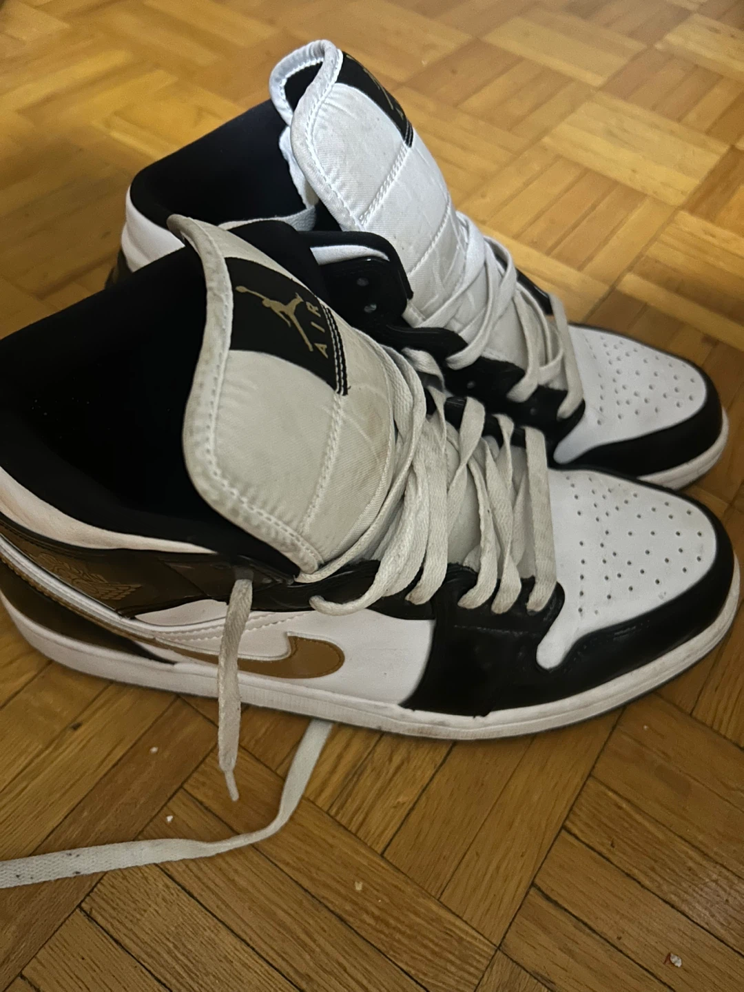Air Jordan 1 Mid Black Gold White Sneakers