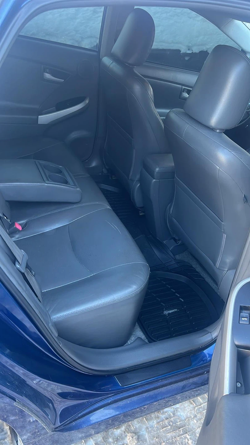 Blue Toyota Prius - Four Door Sedan