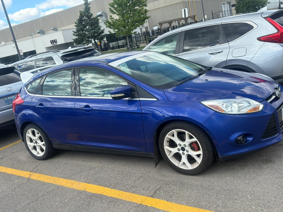 Blue Ford Focus Titanium Hatchback - photo 3