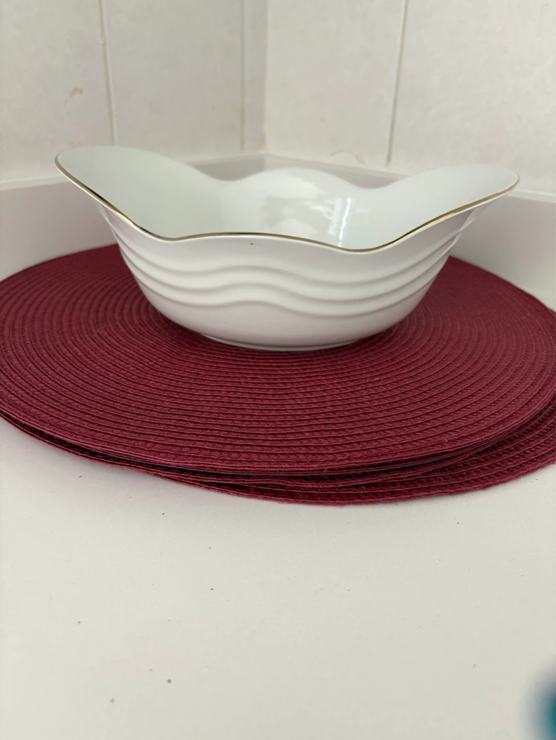White serving bowl with gold trim