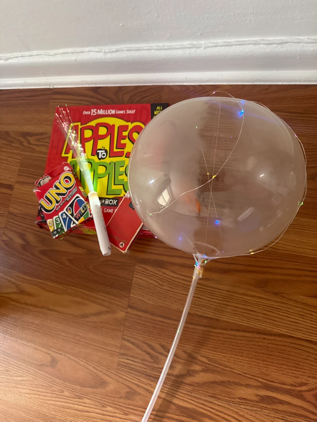 5 for $5 Apples to Apples, UNO, playing cards, and light up toys