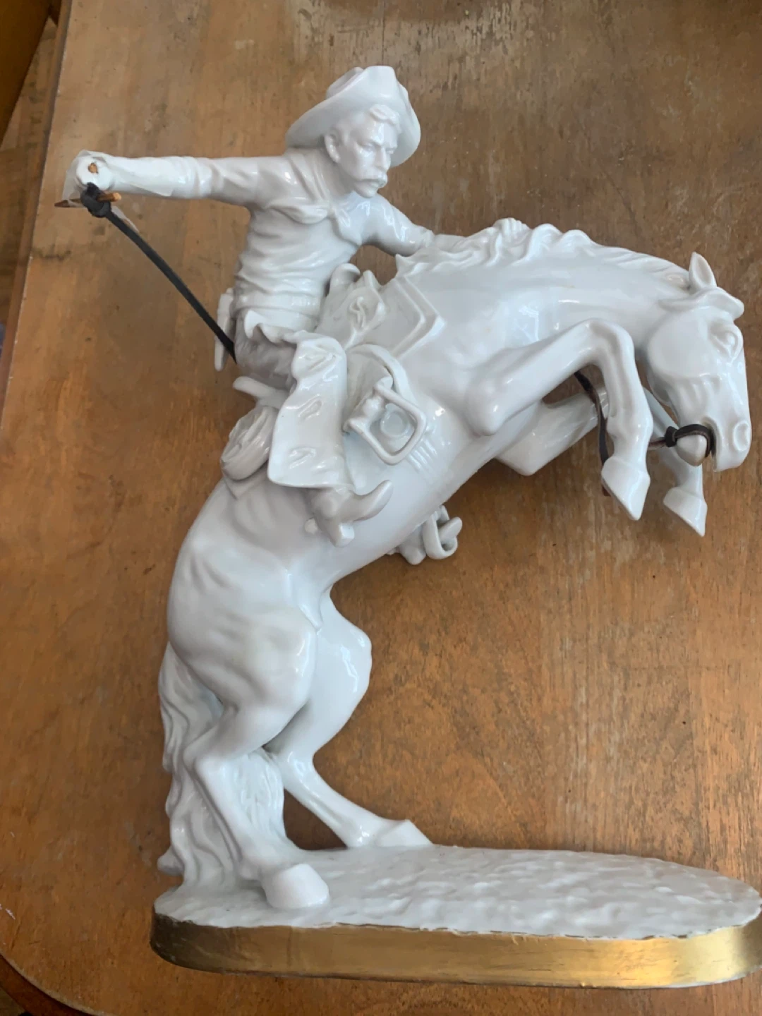White Porcelain Bronco Buster Sculpture - photo 3