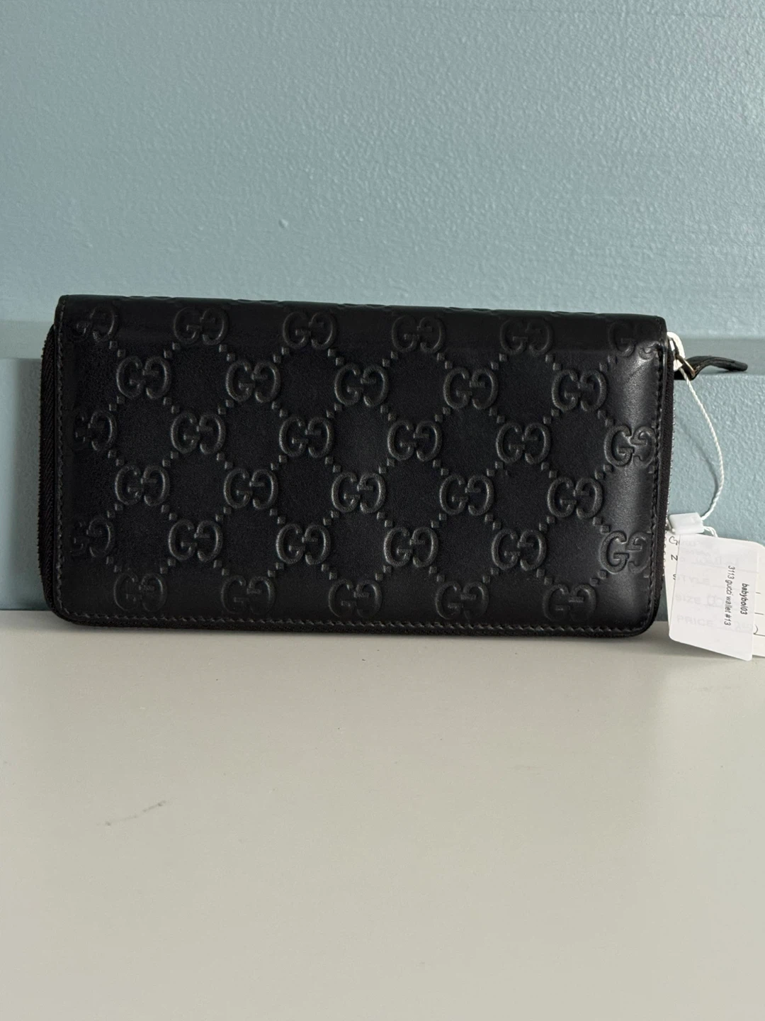 Gucci Black Embossed GG Zip Around Wallet Authentic