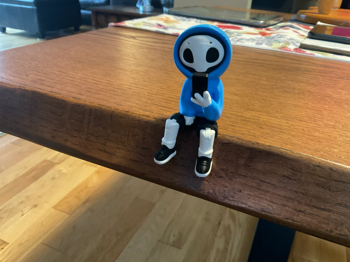 3D Hoodie Skeleton Figurine Holding Phone