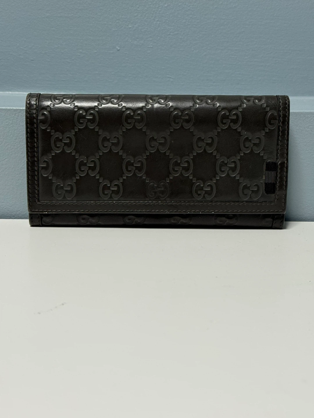 Gucci Embossed GG Continental Flap Wallet