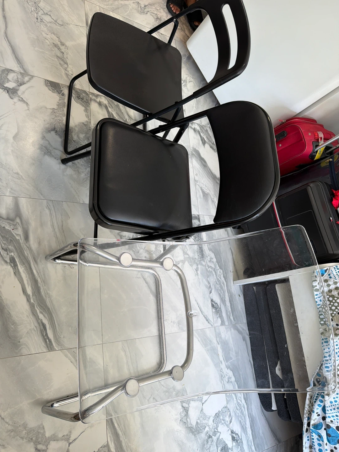 Black Dining Chairs and Clear Accent Chair