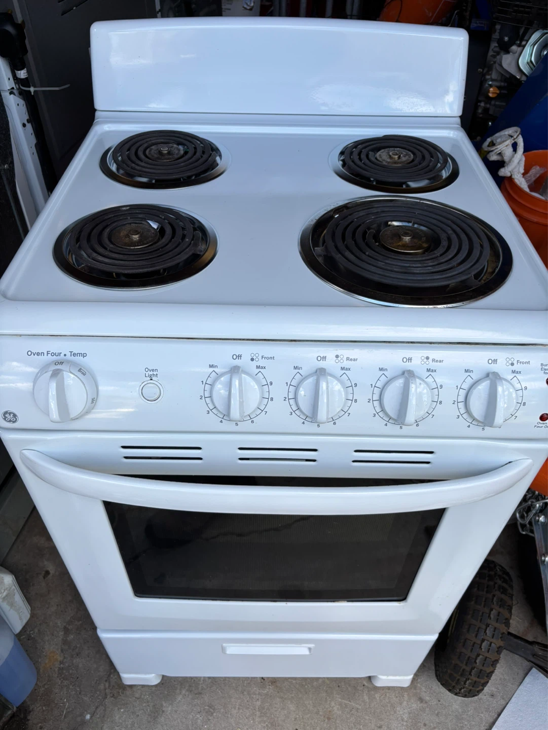 24 inch GE Four Burner Electric Stove with Oven