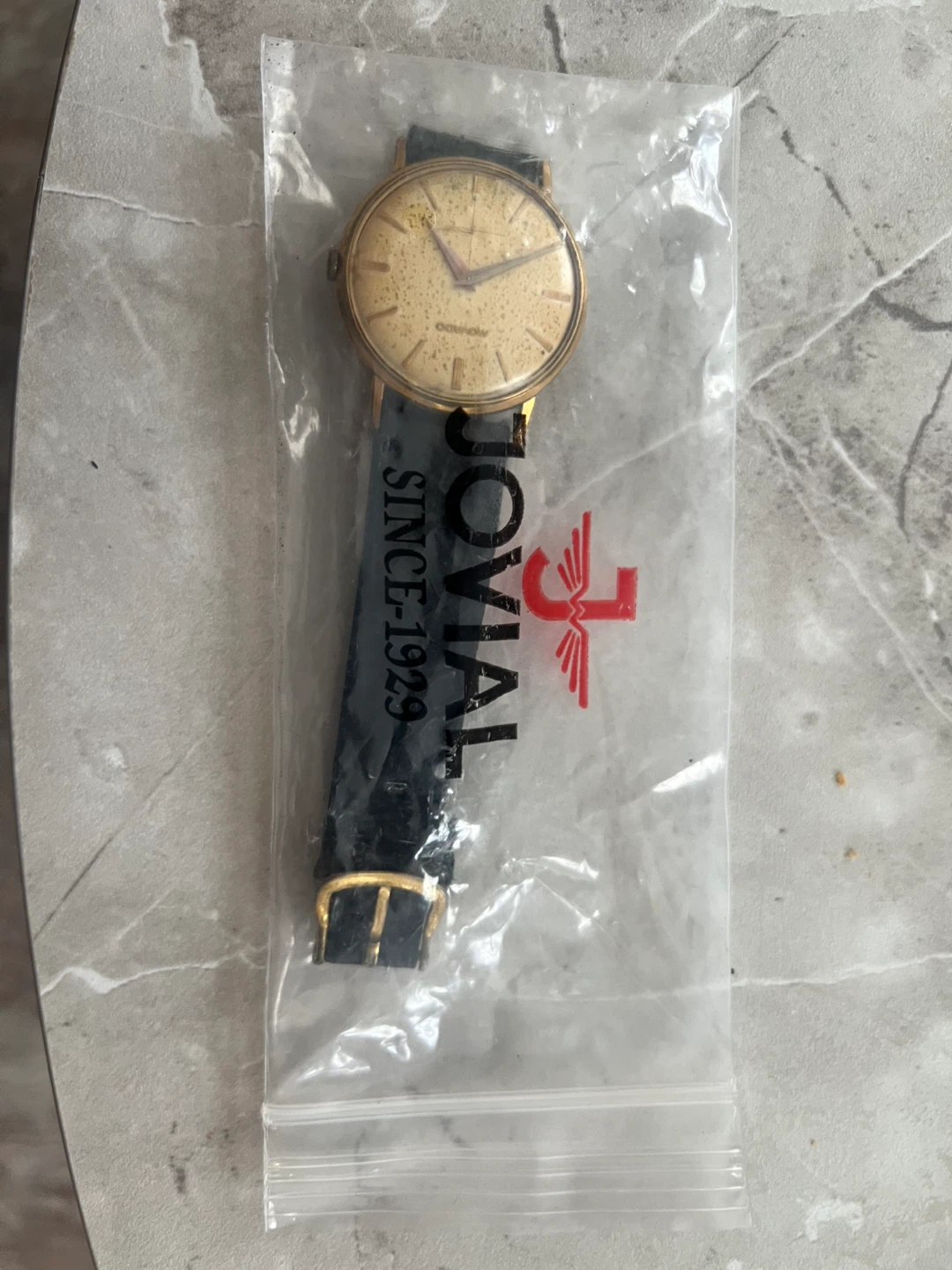 Movado Gold Tone Dress Watch with Black Leather Strap