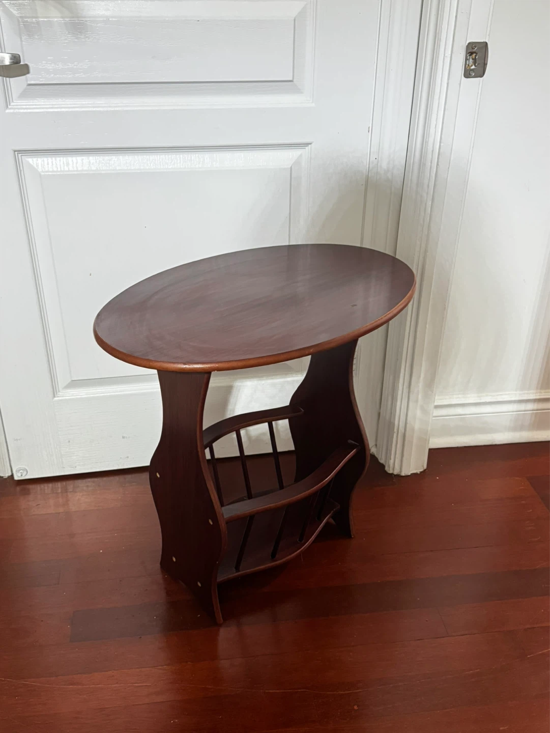Wooden side table with magazine rack