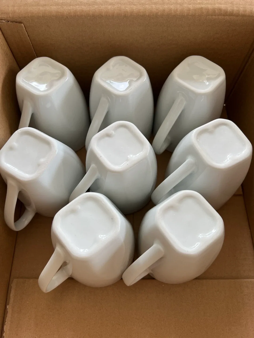 Set of 8 white ceramic mugs