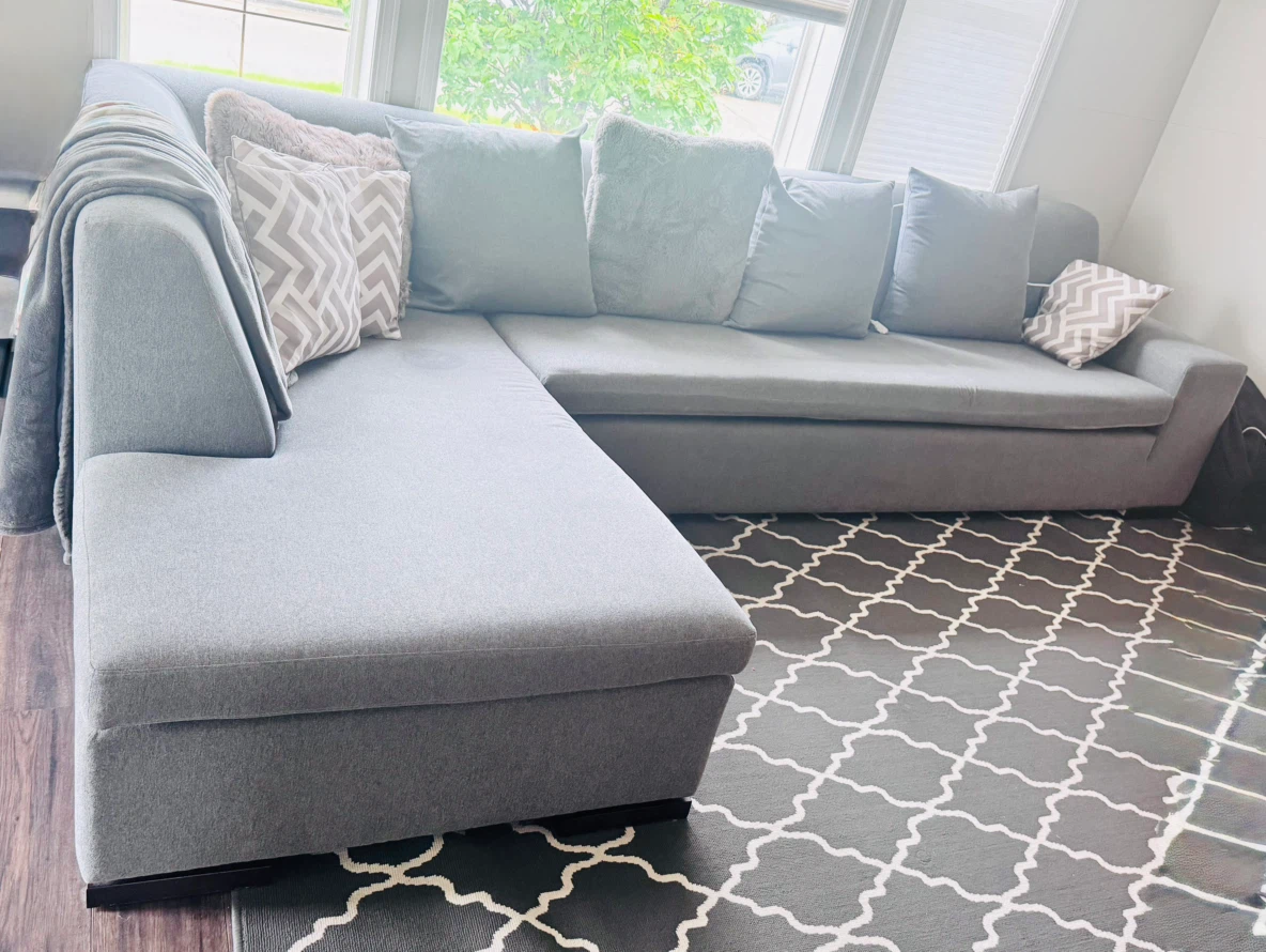 Grey Sectional Sofa with throw pillows