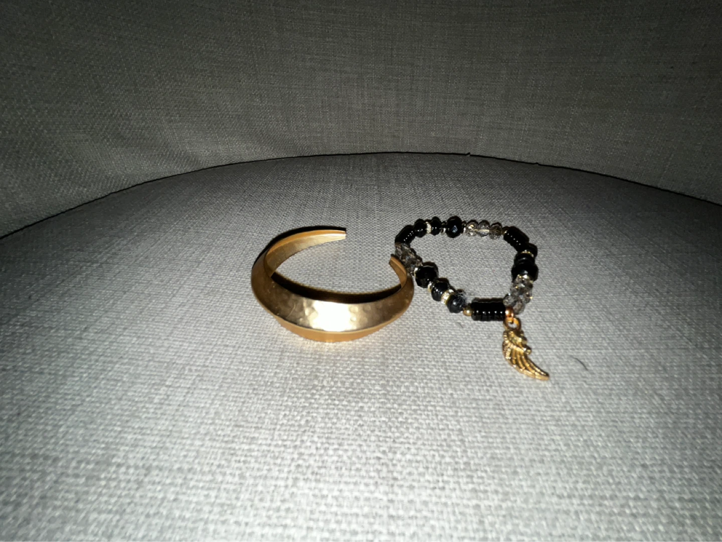 Gold-tone Cuff Bracelet and Beaded Bracelet with Wing Charm