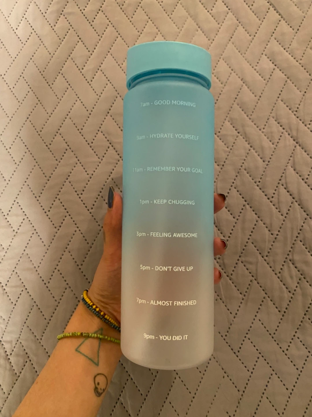 Water bottle with straw