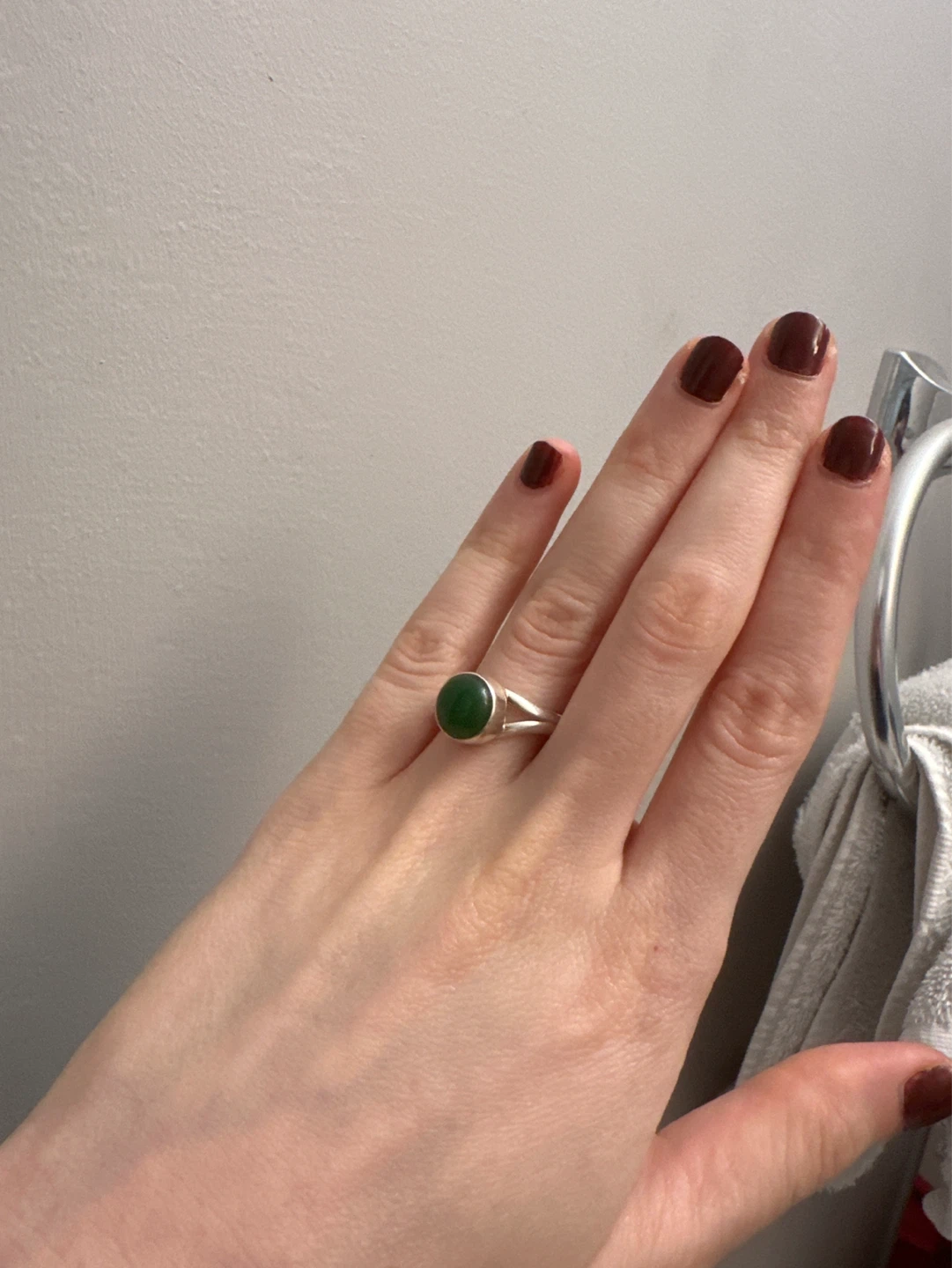 Silver ring with green stone