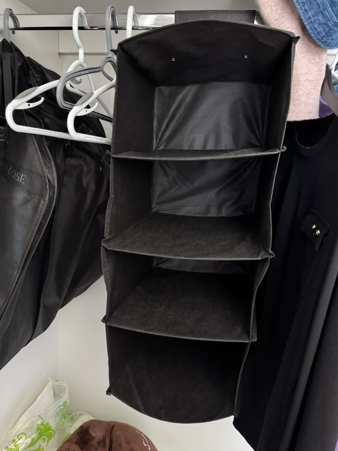 Black hanging closet storage organizer