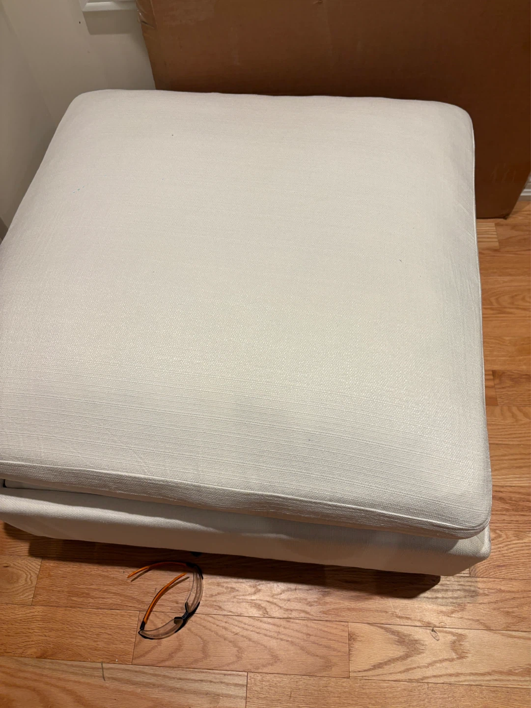 White Fabric Storage Ottoman