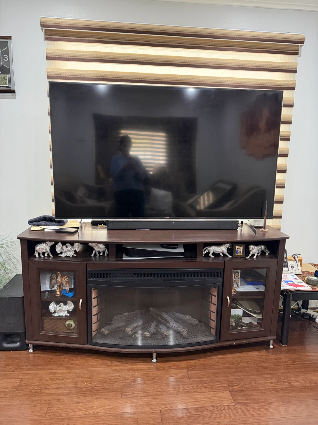 Cozy wooden TV stand  with fireplace