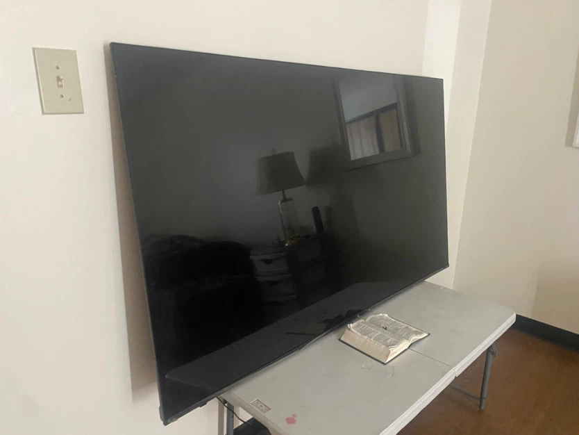 Black Flat Screen Television