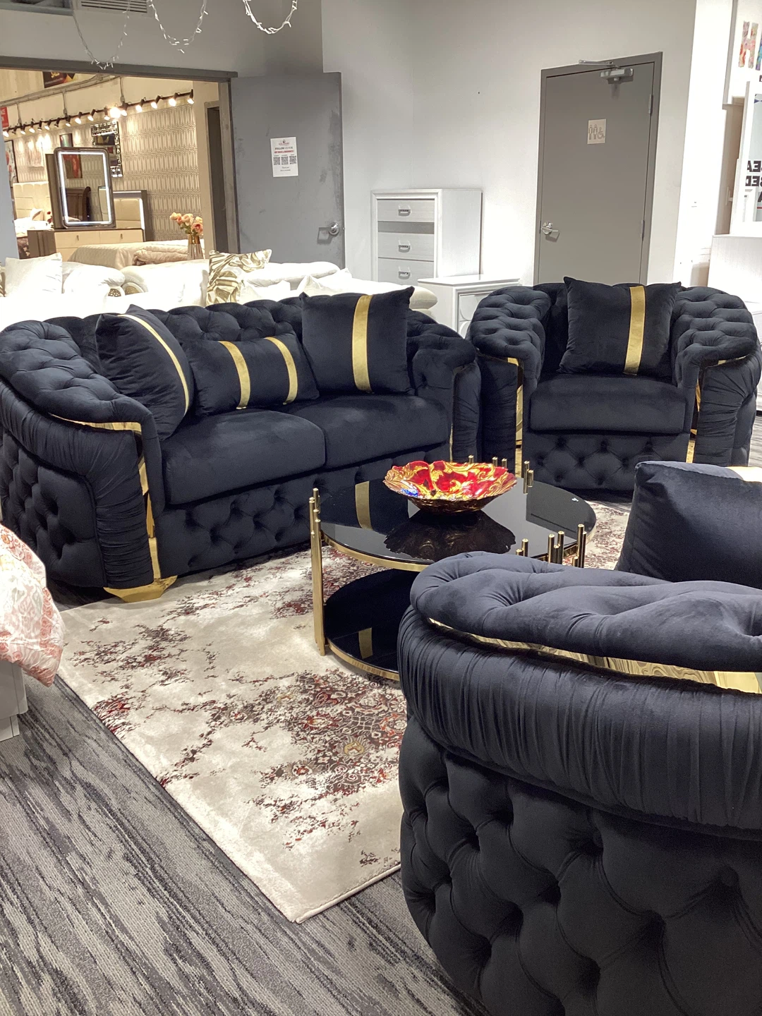 Black Velvet Tufted Sofa with Gold Accents