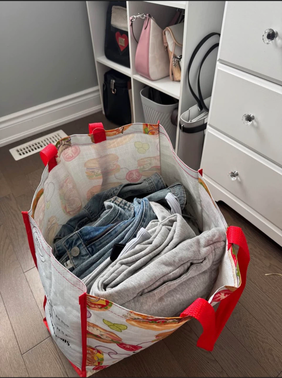 full bag of woman’s clothes