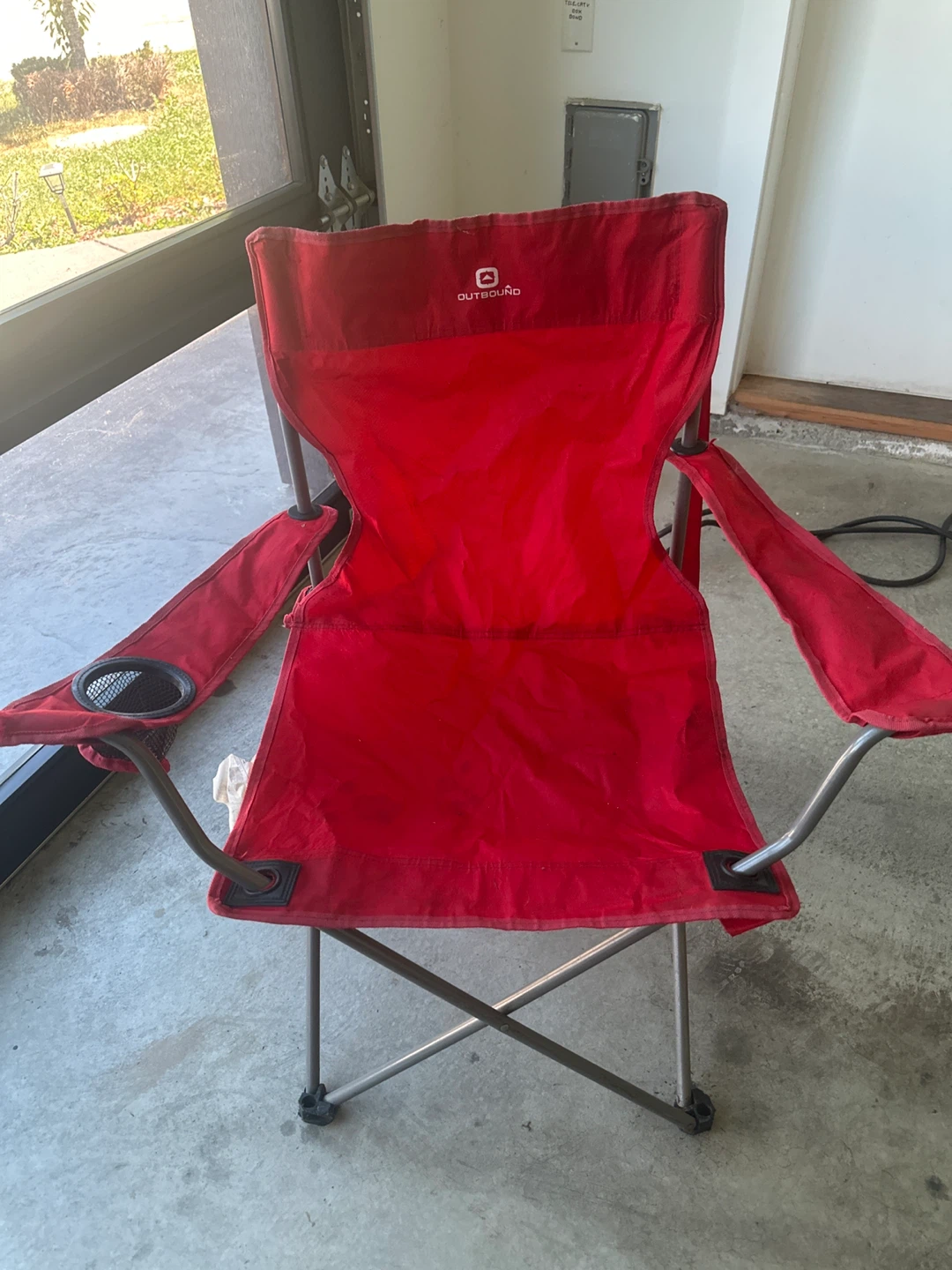 Red Outbound Camping Chair with "BOSS" on back
