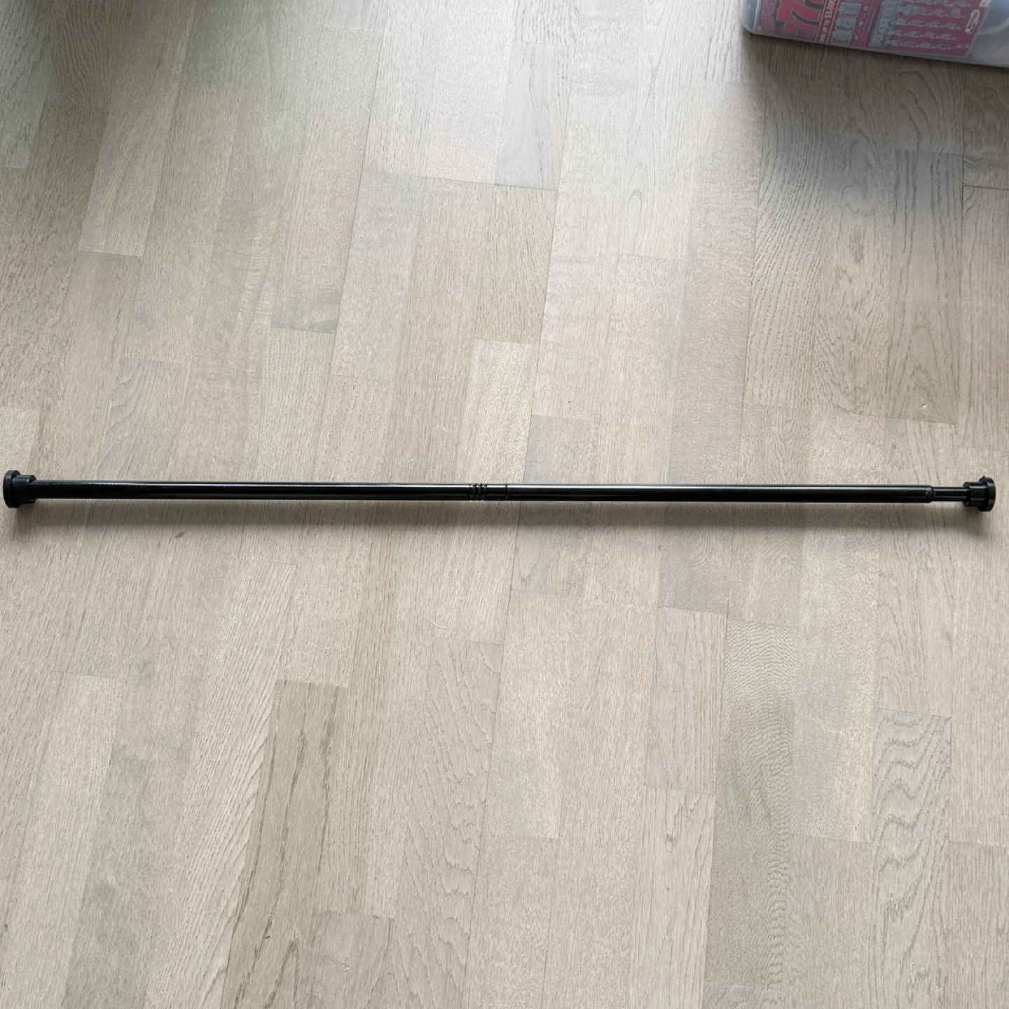 Black Extendable Tension Rod Stick