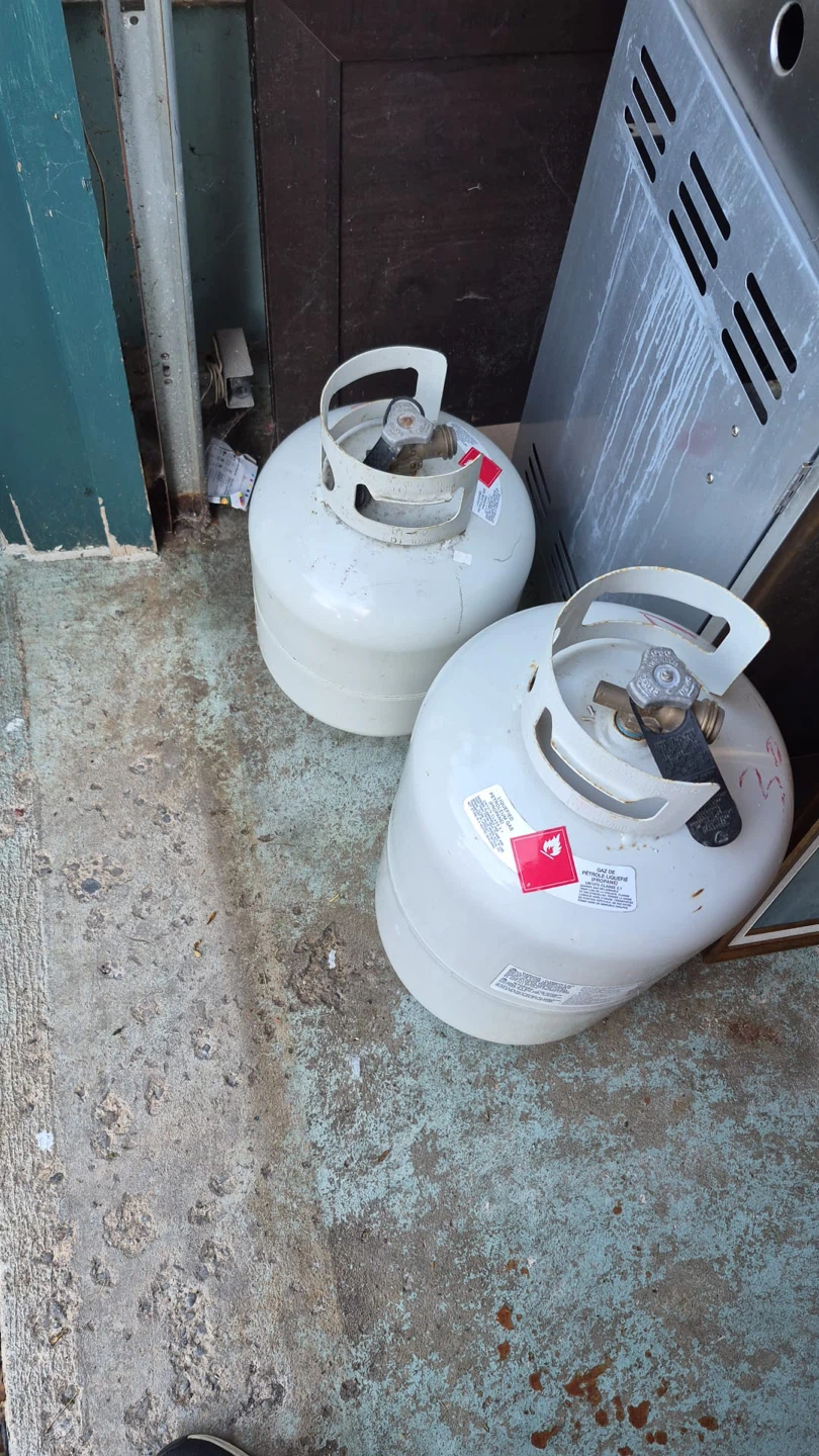 LARGE AND SMALL propane gas tanks