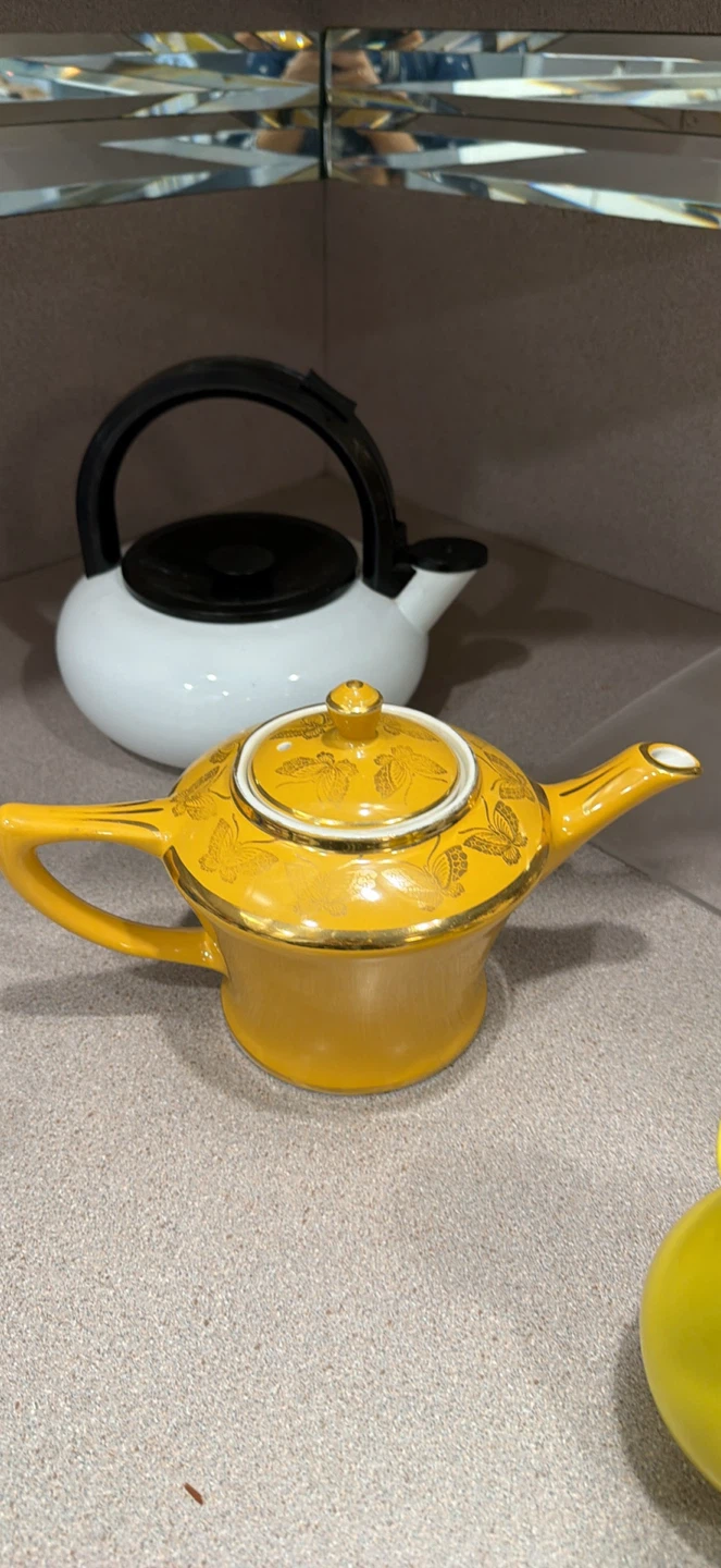 Yellow Teapot with Butterfly Design