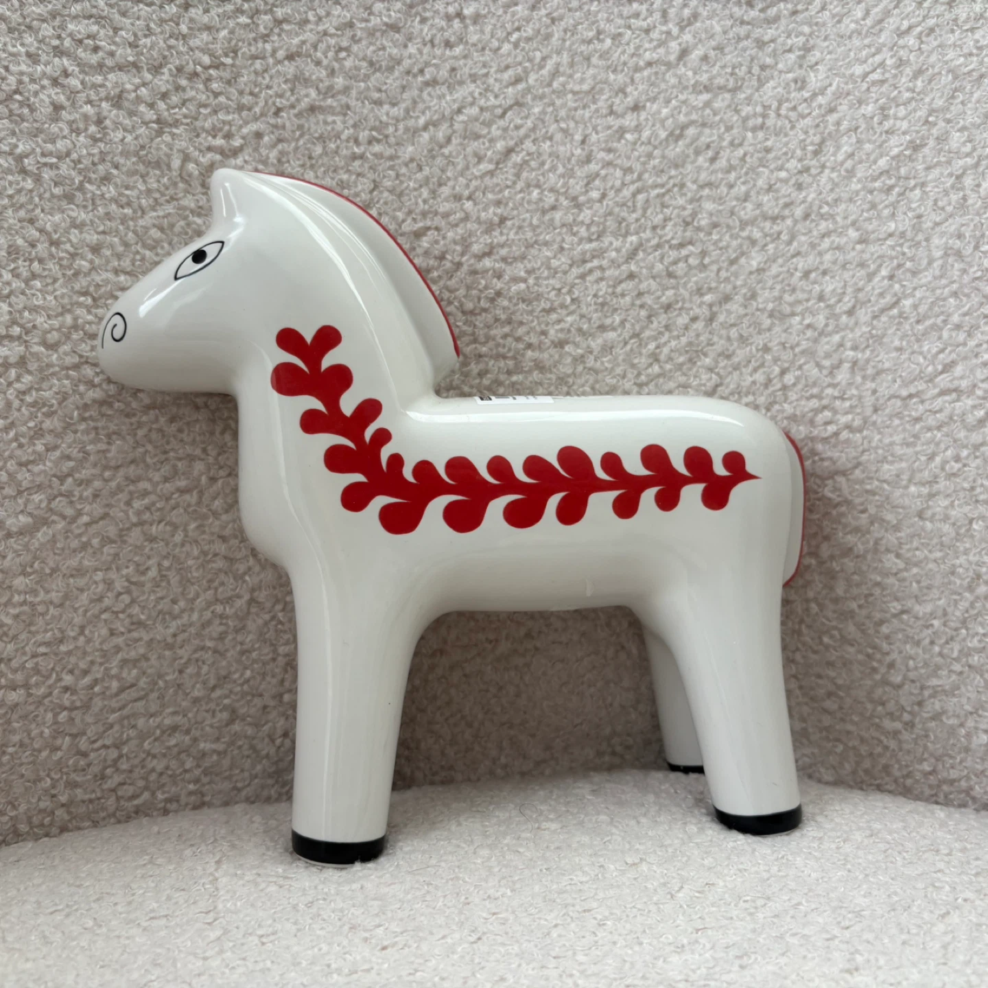 White Ceramic Horse Figurine with Red Pattern